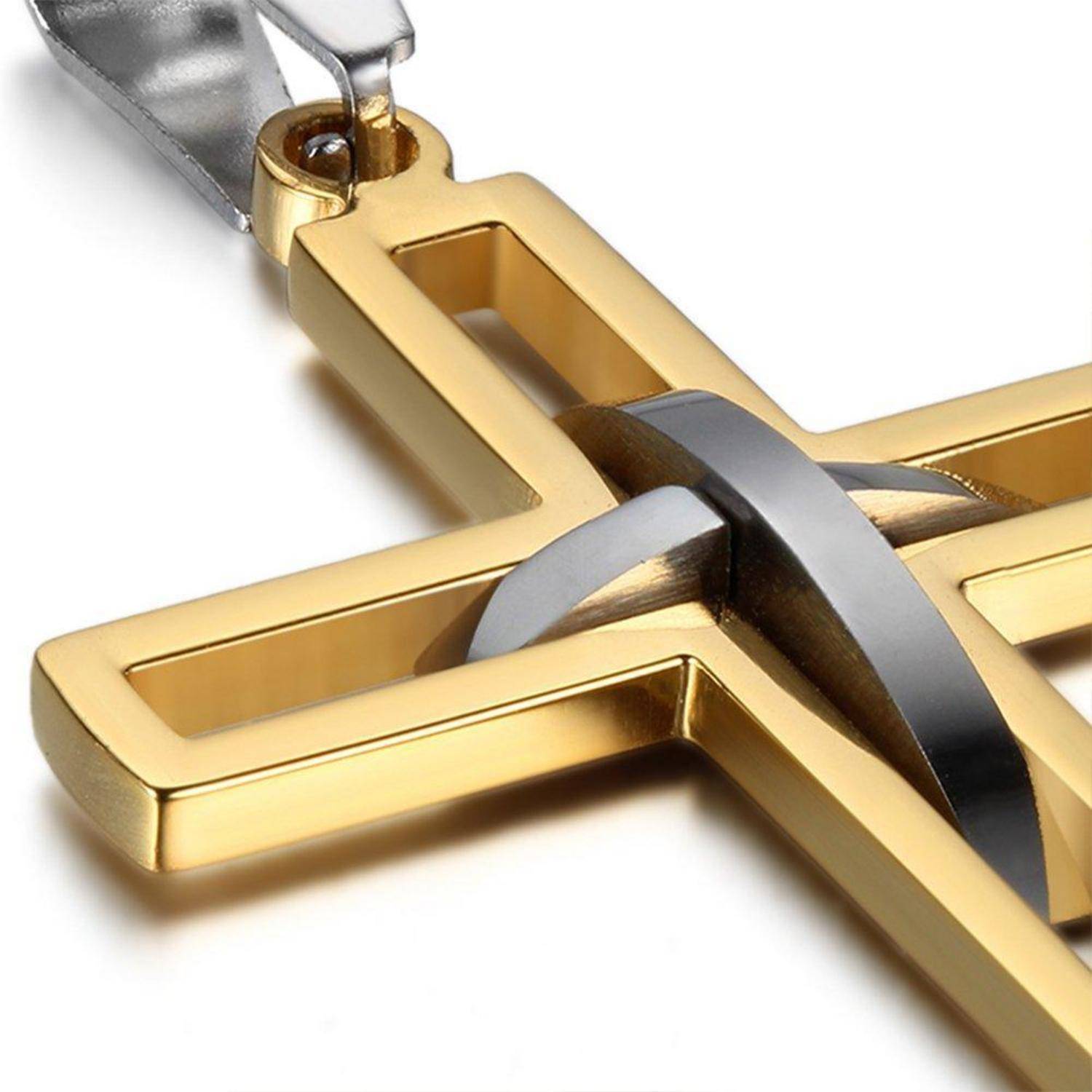 Nahaufnahme eines goldenen Kreuzanhängers mit einer silbernen Öse auf weißem Hintergrund.