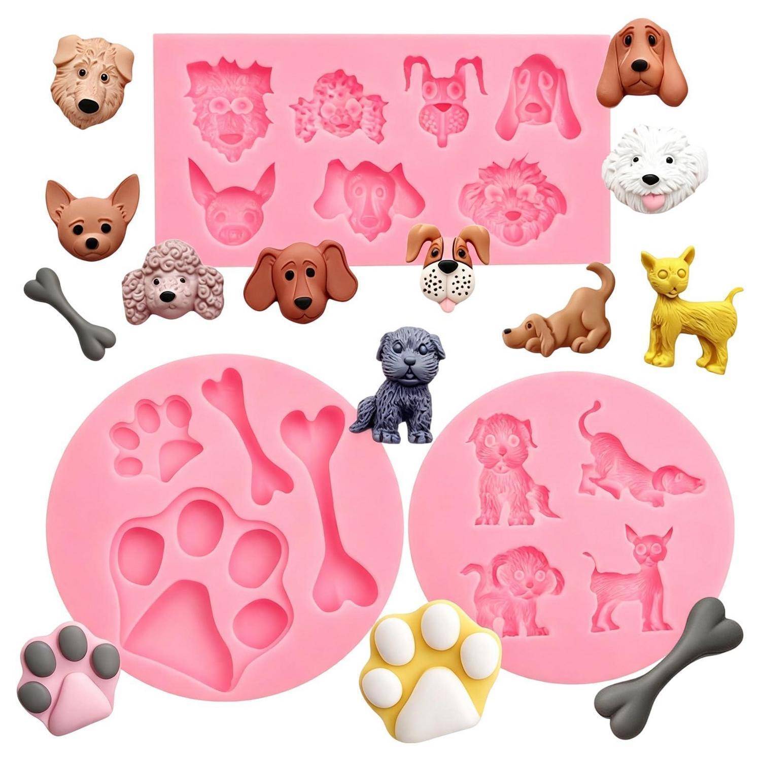 Bild einer Sammlung hundegestalteter Silikonformen und tierförmiger Spielzeugfiguren, einschließlich Pfotenbdrücke und Knochen, angeordnet um rosa Formblätter und runde Tabletts.