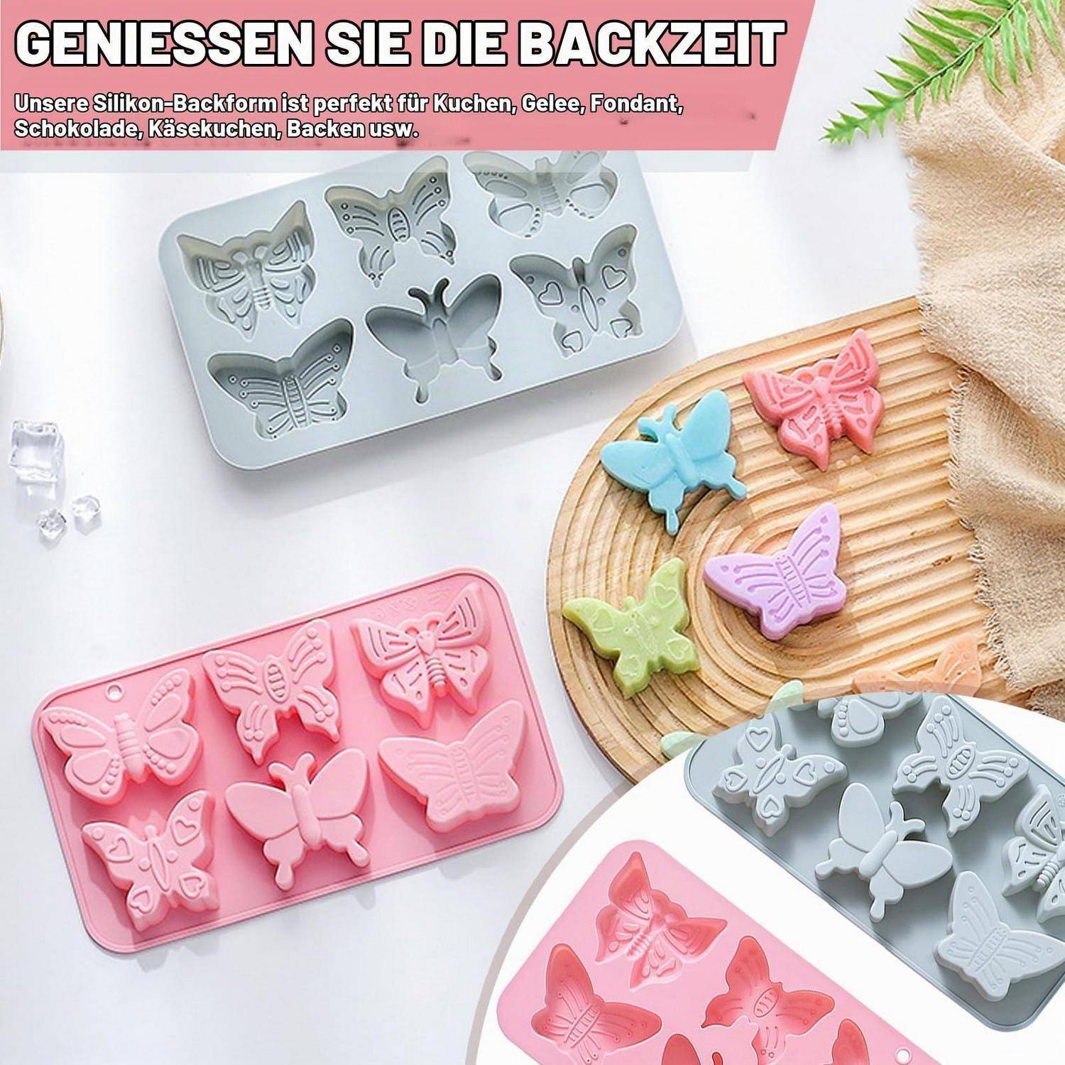 Schmetterlings-förmige Silikon-Backformen in Pastellfarben, die fertige Schmetterlingsgebäcke zeigen und deutschen Text mit Werbung für eine vielseitige Form für Kuchen, Gelee, Fondant und Schokolade.
