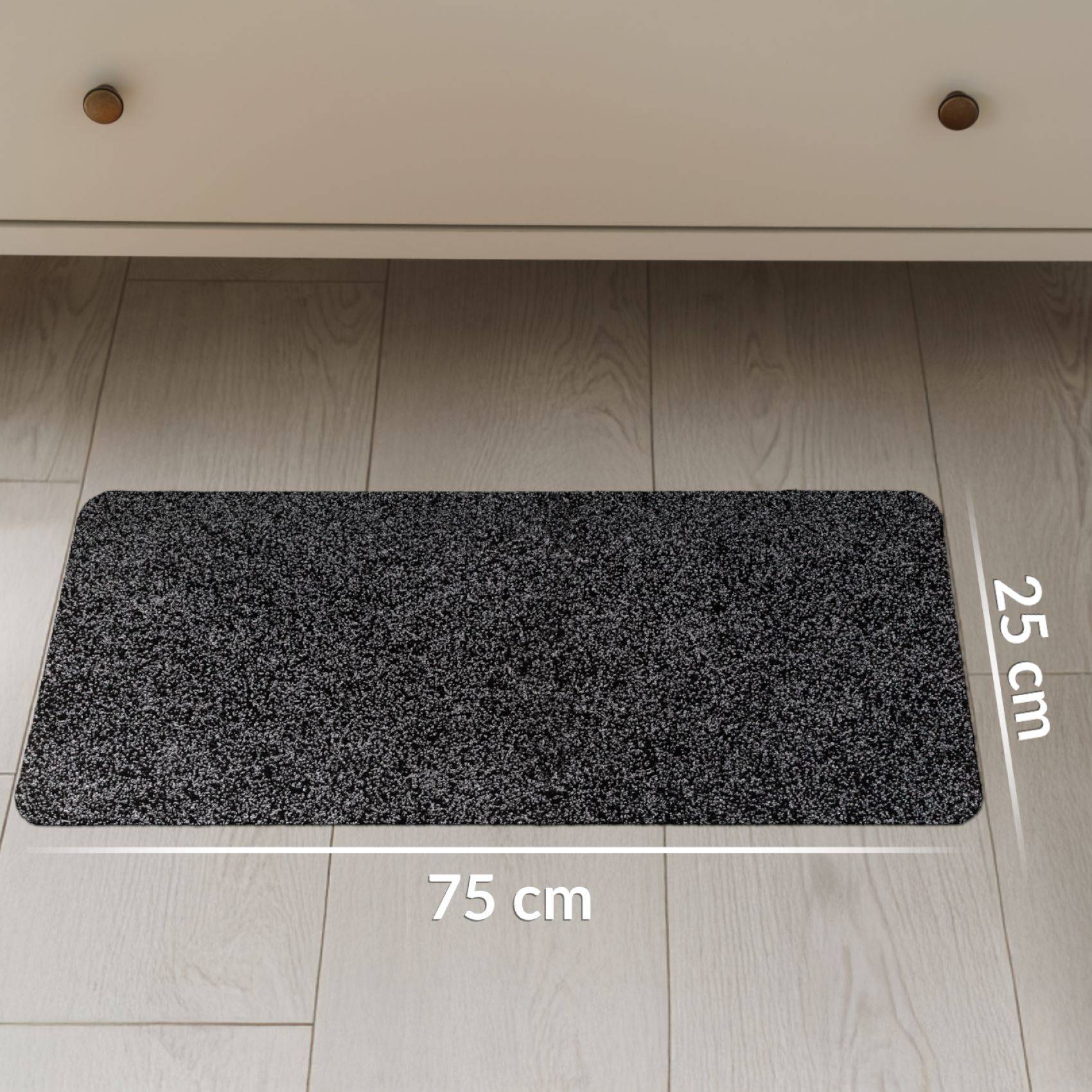 Rechteckige dunkel gefleckte Matte auf hellem Boden, beschriftet mit 75 cm Breite und 25 cm Tiefe.