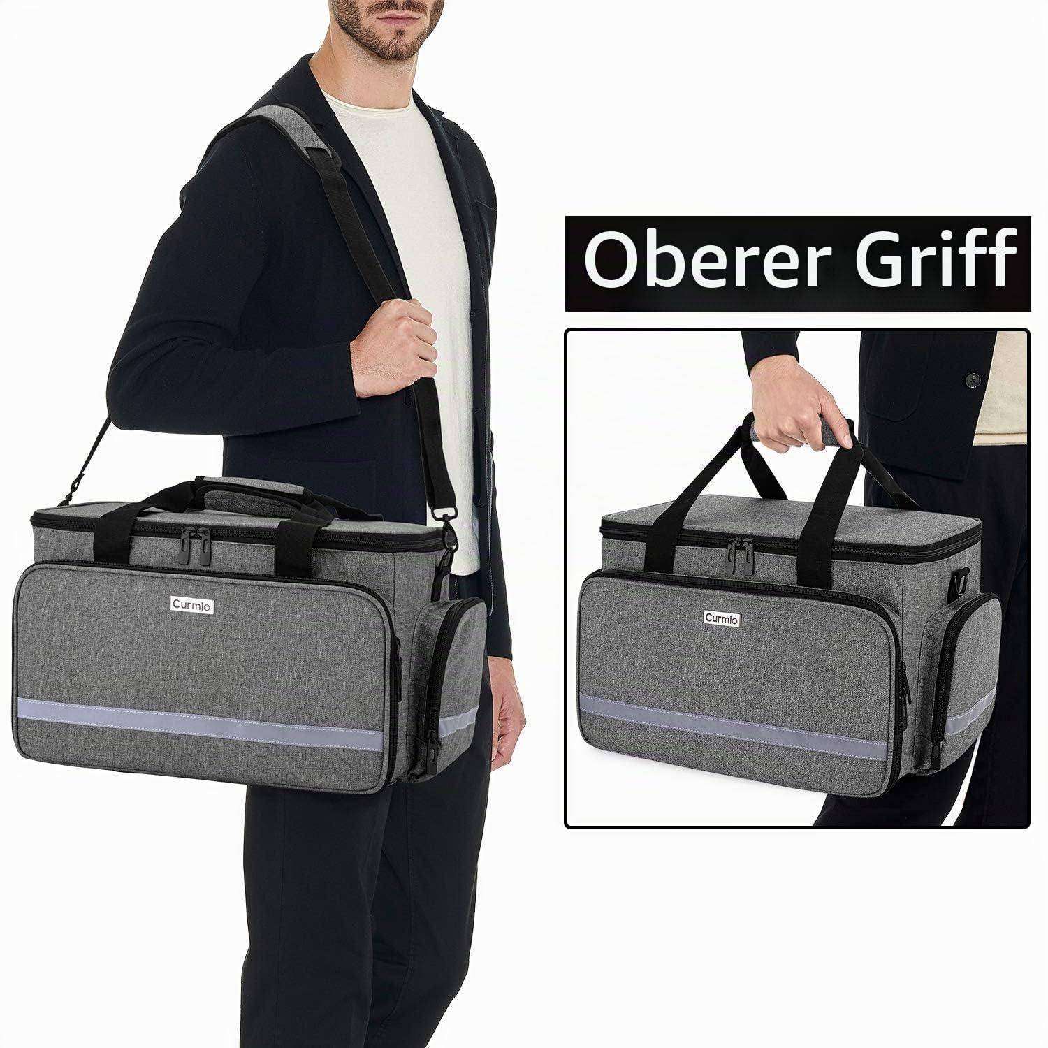 Mann, der eine graue isolierte Kühlertasche mit Schultergurt und Griffen oben trägt; die Einführung zeigt den oberen Griffgriff.
