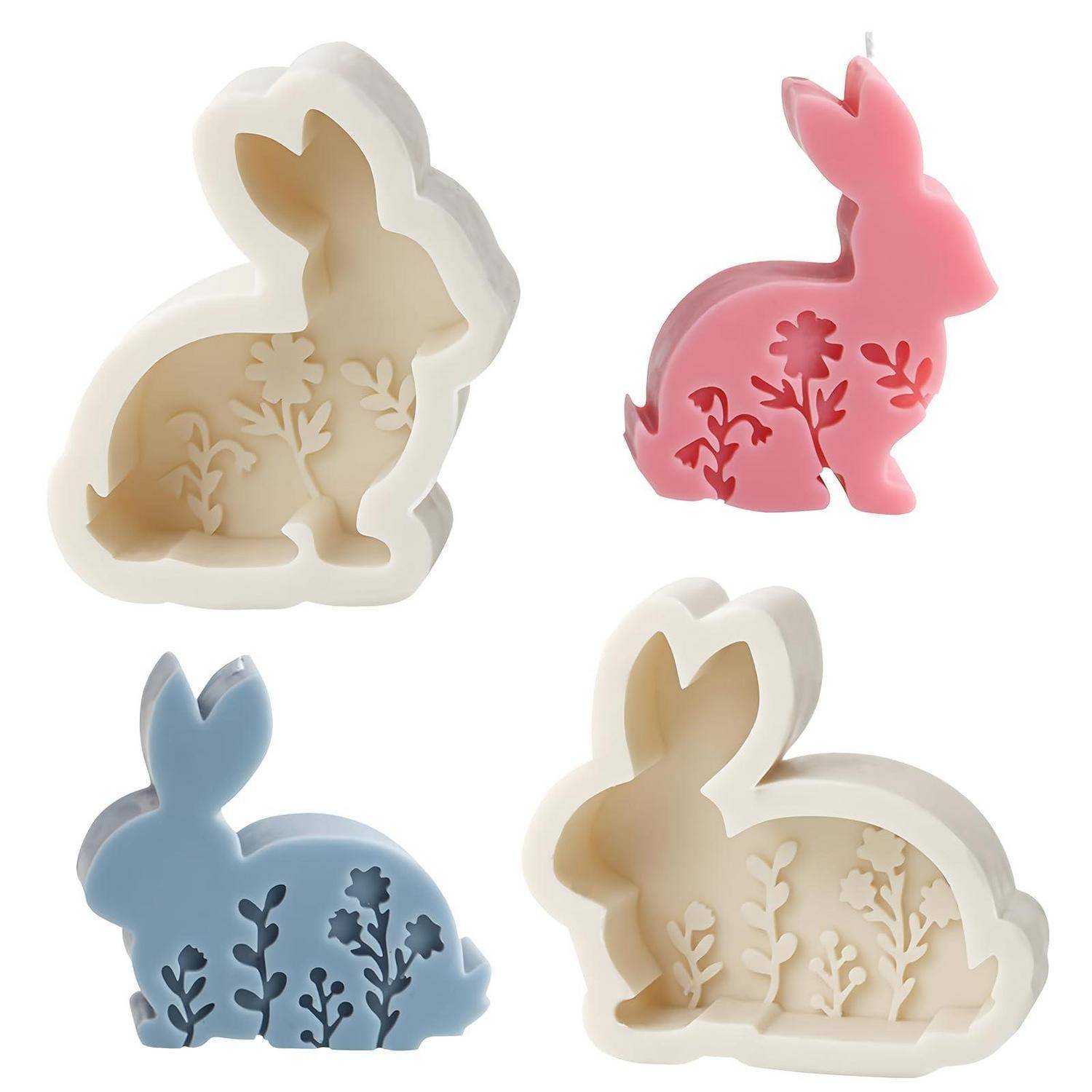 Vier kaninchenfömige Dekorationsmöbel in Creme, Rosa und Blau, jeweils mit ausgeschnittenen Blumenmuster.