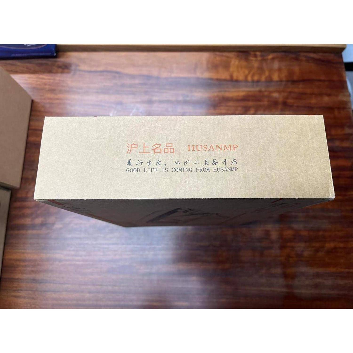 Oberfläche einer goldenen Produktbox mit der Aufschrift „HUSANMP