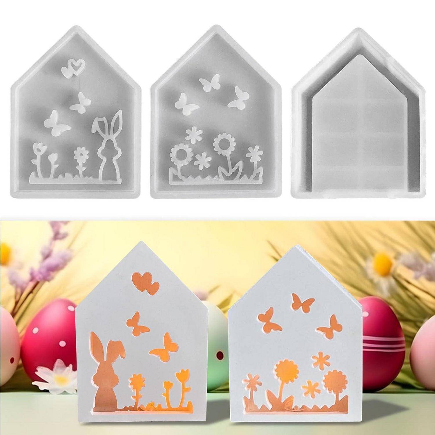 Satz von hausförmigen Anzeigeboxen: drei schlichte weiße Boxen in der oberen Reihe leer gezeigt, und zwei dekorierte Osterboxen mit orangegelbem Hasen, Schmetterlingen und Blumen vor pastellfarbenen Eiern.