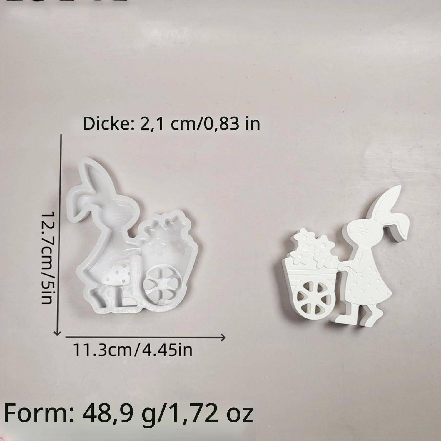 Weiße kaninchen-förmige Dekorform mit den Abmessungen 12,7 cm x 11,3 cm und einer Dicke von 2,1 cm; Gewicht 48,9 g.