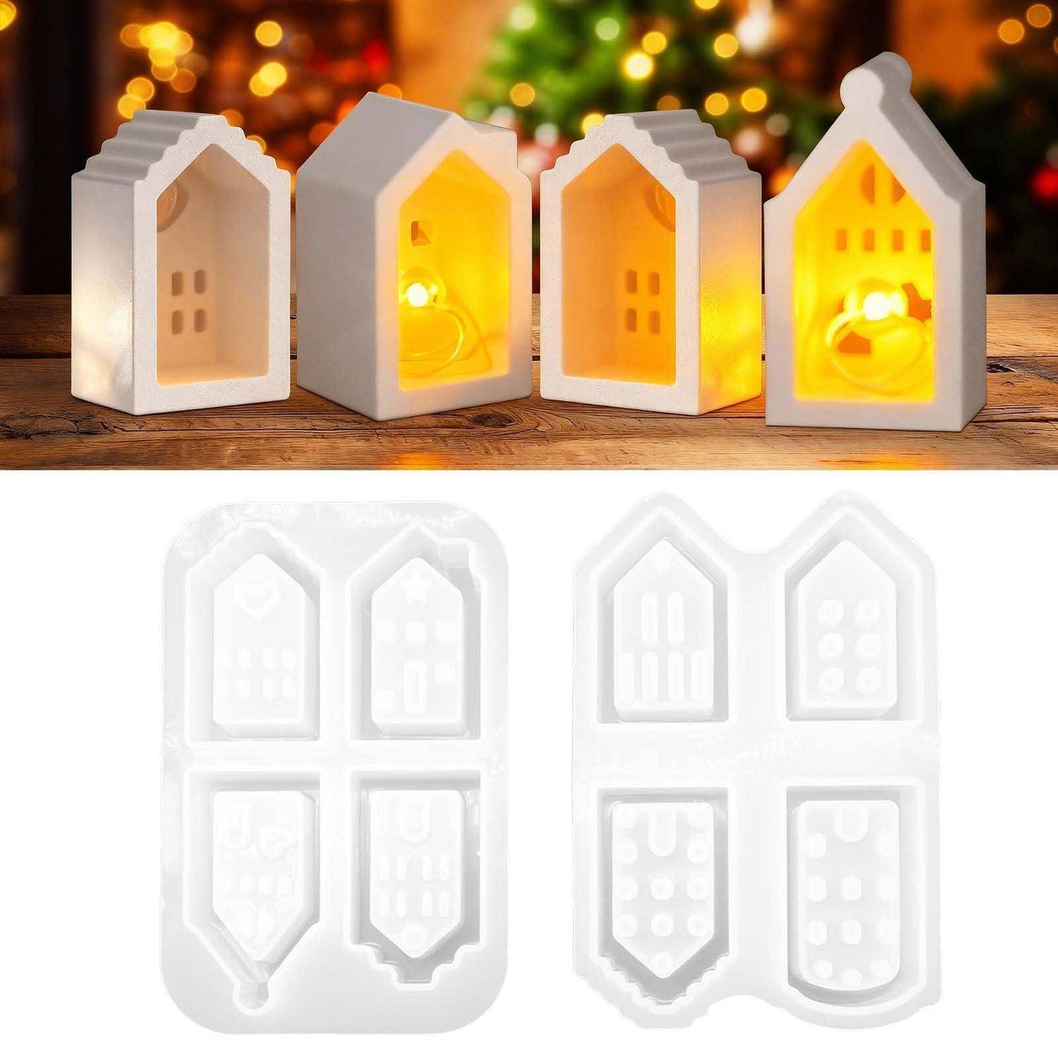 Weiße keramische Kerzenhalter in Hausform, beleuchtet auf einer Holzoberfläche gezeigt, mit weißen Silikonformschalen darunter zum Herstellen der Hausdesigns.