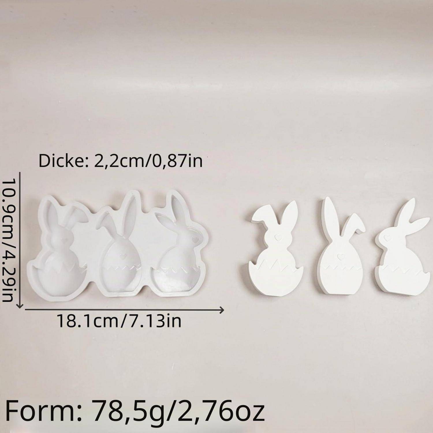 Weiße hasenförmige Formen oder Ausstecher mit Größenangaben: 18,1 cm breit, 10,9 cm hoch, 2,2 cm dick und „Form: 78,5 g/2,76 oz