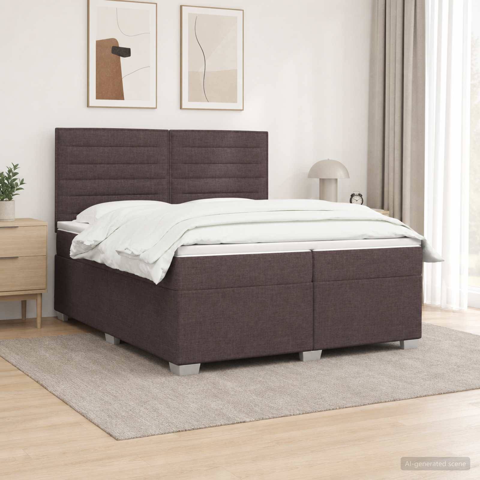 Modernes Polsterbett mit hohem gepolstertem Kopfteil, weißer Bettwäsche und passendem Stauraumbett in einem hellen minimalistischen Schlafzimmer