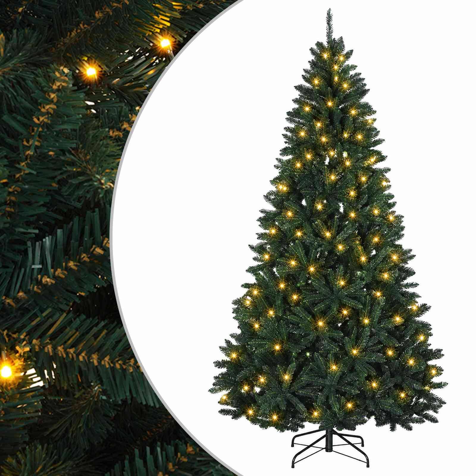 Künstlicher Weihnachtsbaum mit warmweißen Lichtern auf einem Metallständer, gezeigt vor weißem Hintergrund mit einer Nahaufnahme der beleuchteten Äste auf der linken Seite.