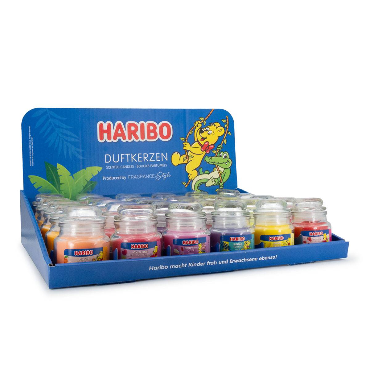 Präsentation von HARIBO-Duftkerzen in kleinen Glaskrügen mit verschiedenen Farben, angezeigt in einem blauen Einzelhandelstablett und mit der Aufschrift 