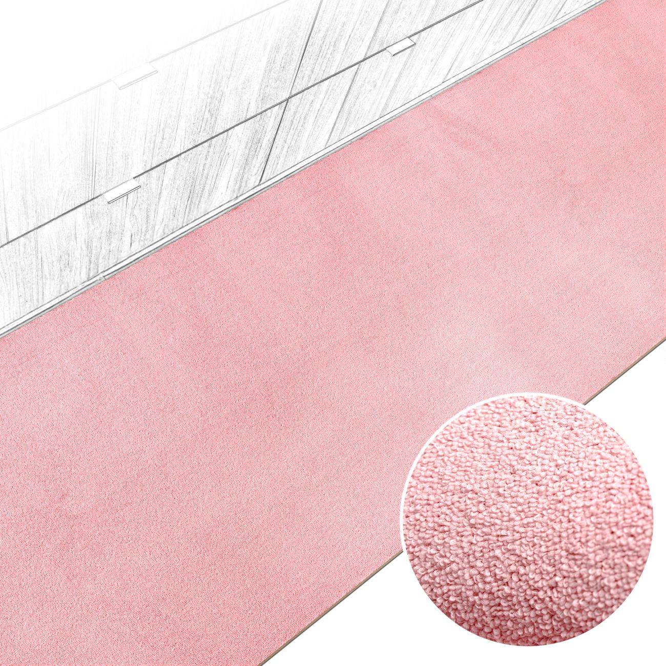 Nahaufnahme einer rosa strukturierten Oberfläche mit einem kreisförmigen Ausschnitt, der das stoffähnliche Korn im Detail zeigt.