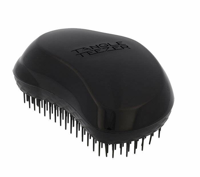 Schwarze Tangle Teezer Haarbürste mit flexiblen Borsten, auf weißem Hintergrund dargestellt.