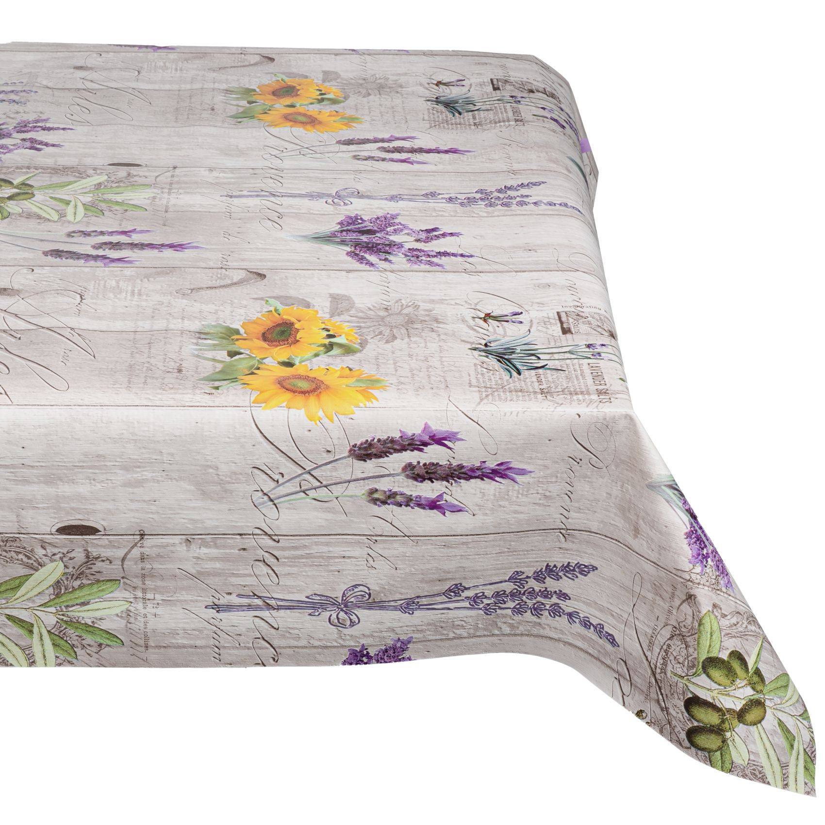 Blumige Tischdecke mit Sonnenblumen und Lavendel auf hellmaserigem Holzgrund, über eine Tischkante drapiert.