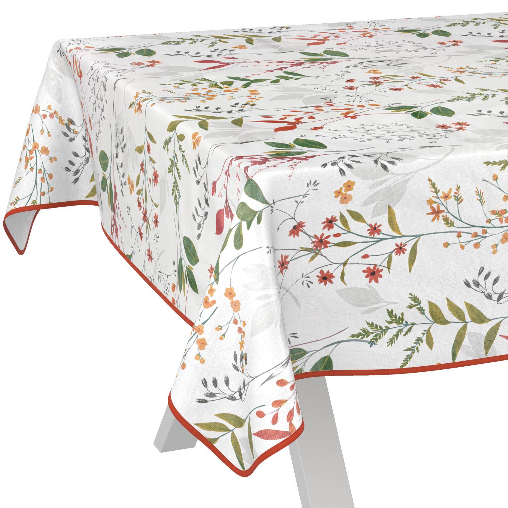 Rechteckige Tischdecke mit weißem Hintergrund und Blumenzweig-Druck, mit rotem Saum eingefasst, über einem Tisch drapiert.