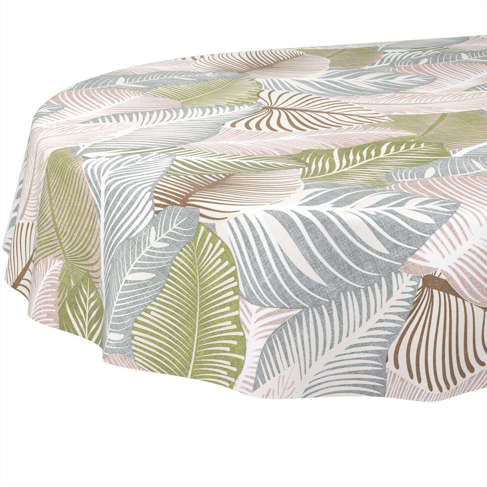 Tisch bedeckt mit einer Tischdecke mit Blattmuster in Pastelltönen in Grün, Grau, Beige und Weiß.