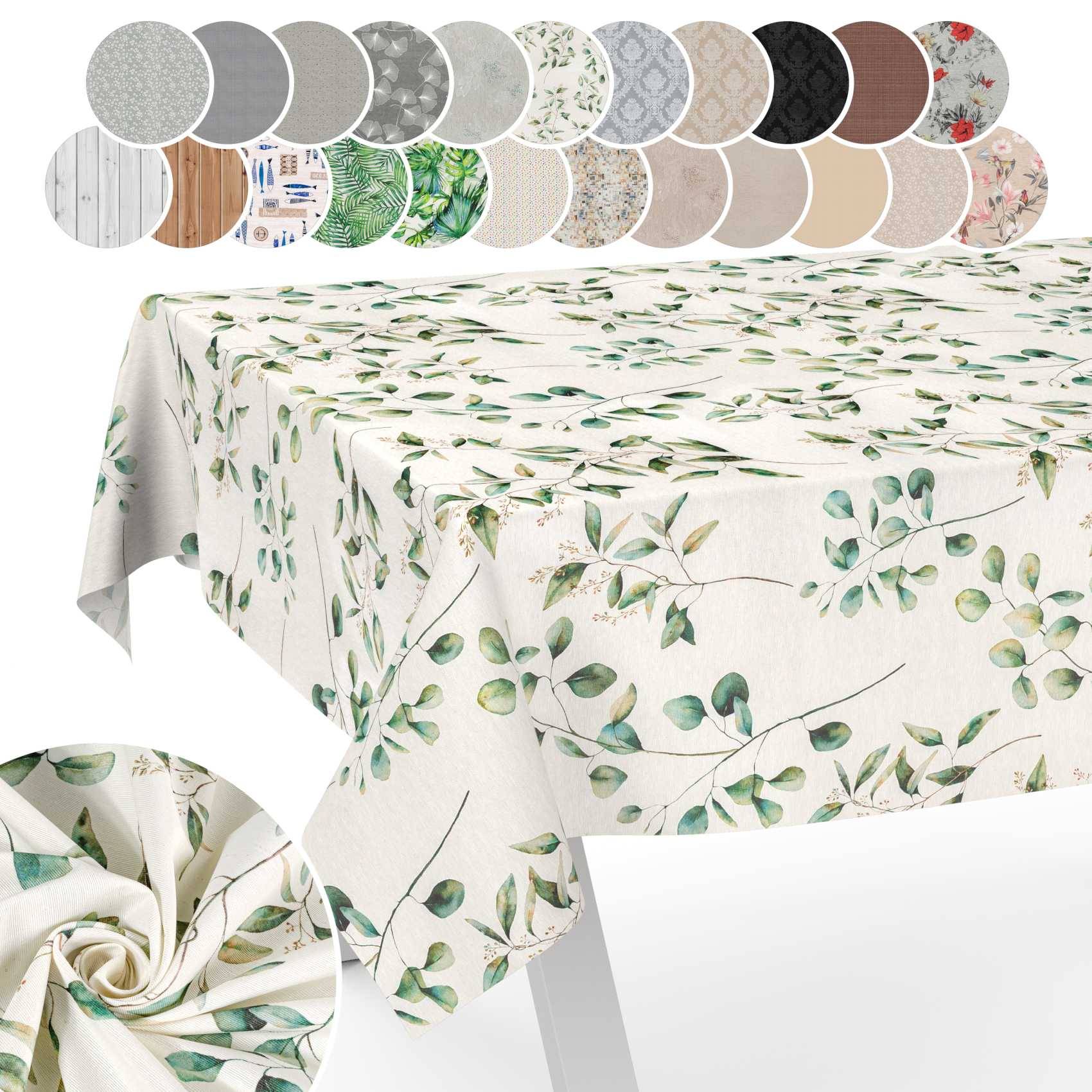 Tischdecke mit grünem Blatt-Aquarellmuster auf weißem Hintergrund, über einen Tisch drapiert dargestellt, mit Stofffarbmustern oben und einer Nahaufnahme einer Falte eingefügt.
