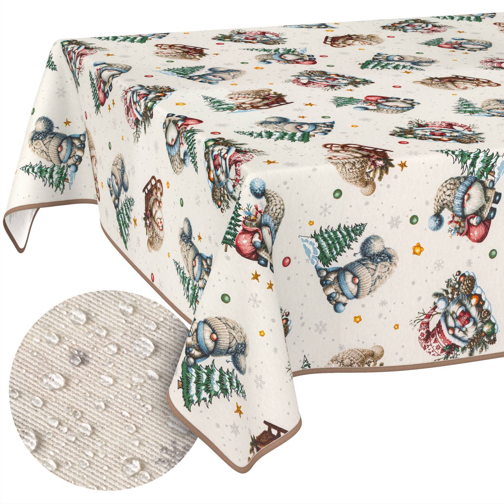 Cremefarbene Tischdecke mit festlichem Winterdruck von Schneemännern, Ornamenten und Kränzen; Ausschnitt zeigt Nahaufnahme des strukturierten Gewebes.
