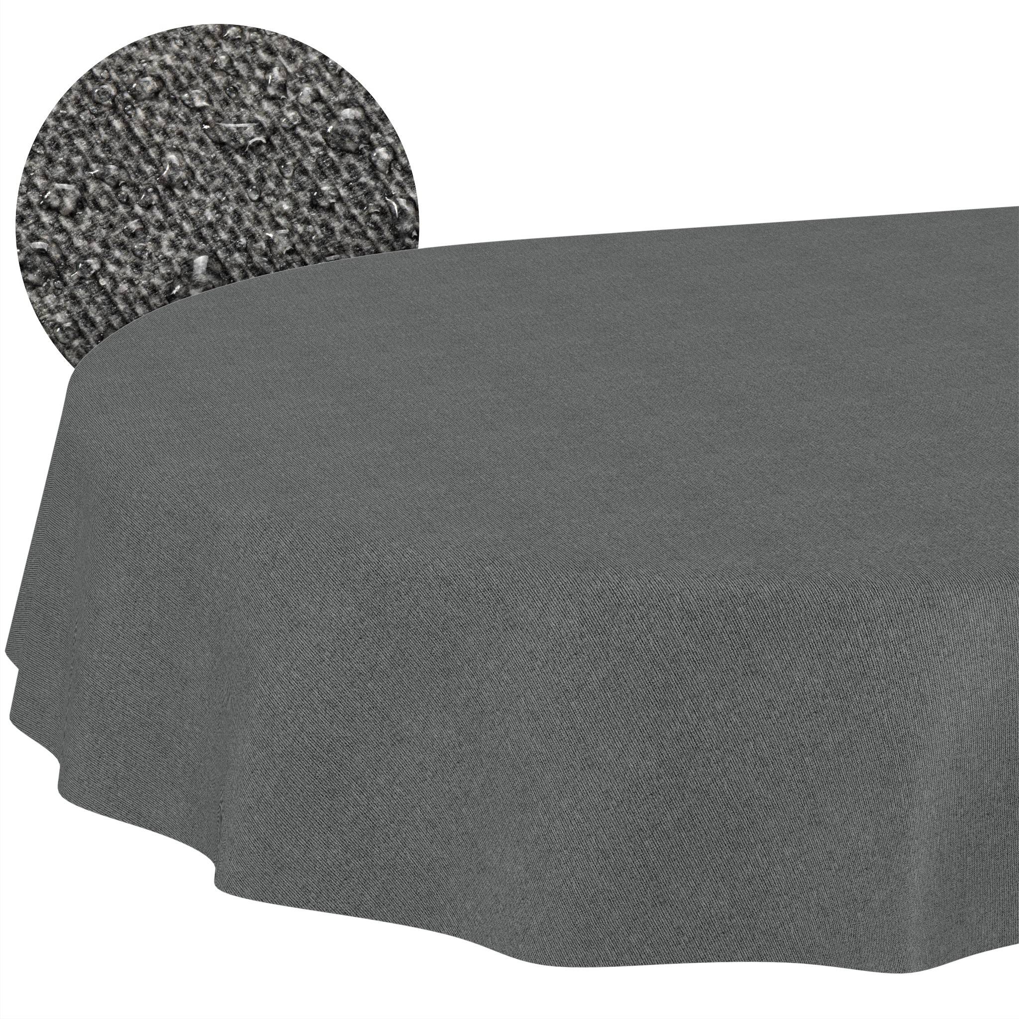 Graue Tischdecke mit elastischen Kanten, die über einen rechteckigen Tisch drapiert ist; ein eingefügter Kreis hebt die Stofftextur hervor.
