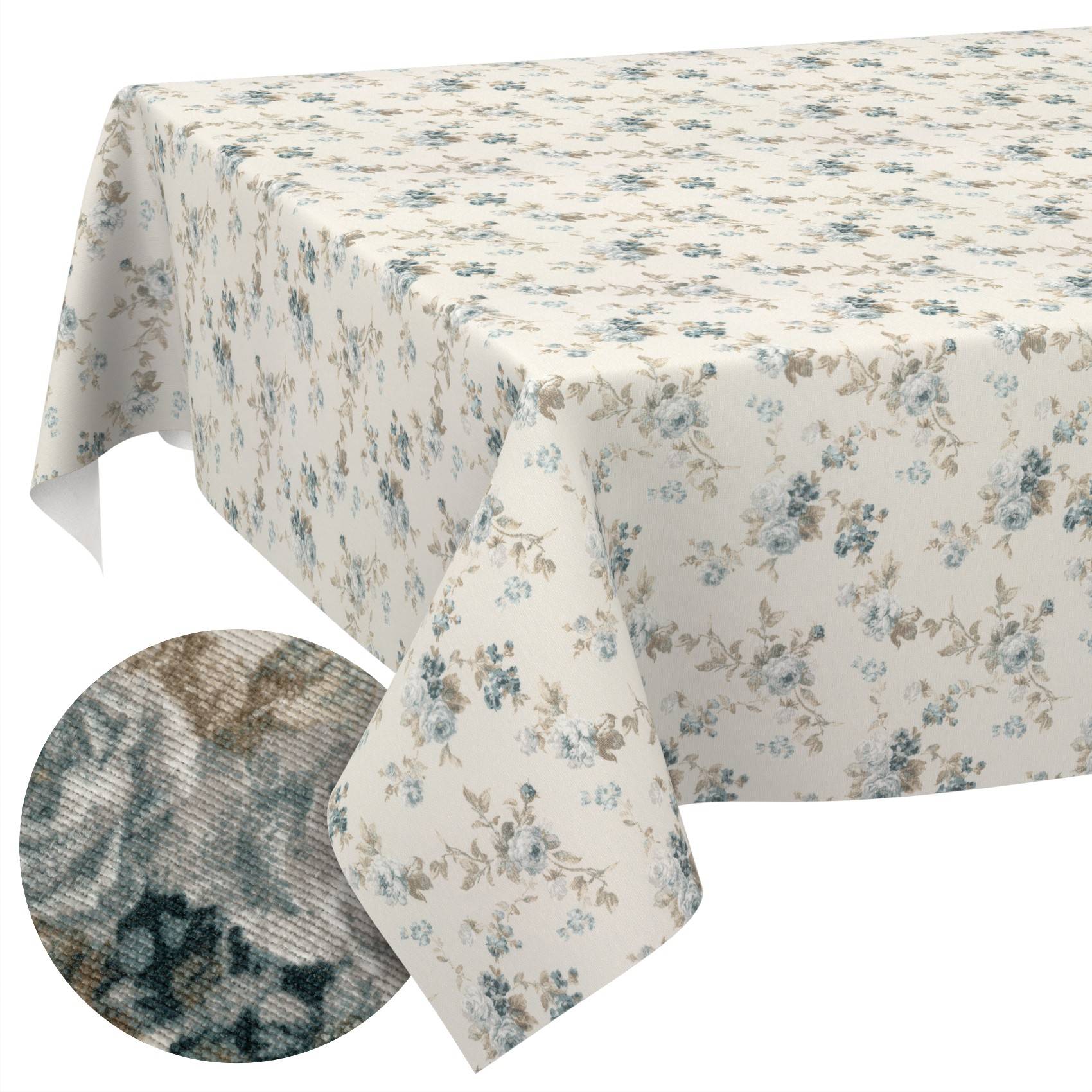Cremefarbene Blumentischdecke, die über einem Tisch drapiert ist, mit einer kreisförmigen Einblendung, die das strukturierte Nahaufnahmemuster des Stoffes zeigt.