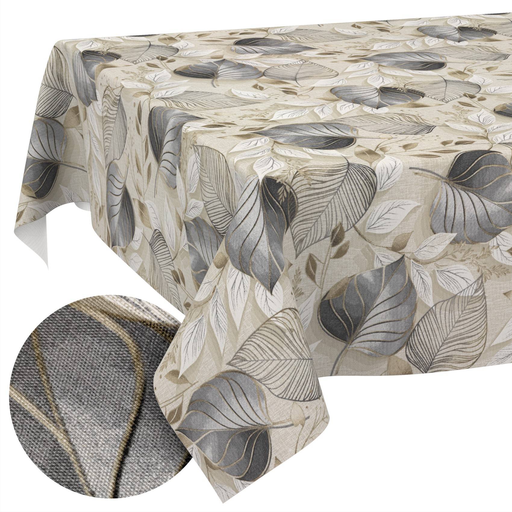 Beigefarbiges Tischdecke mit grauem Blatmuster, draped über einem Tisch mit einer Nahaufnahme der Stoff-Textur.