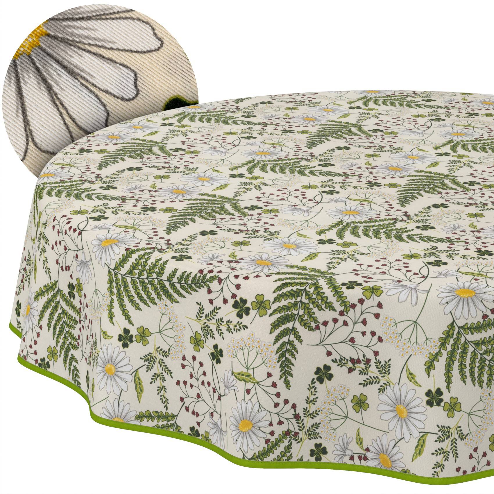 Bett mit einer weißen Tagesdecke mit Blüten- und Farnmuster, gezeigt mit einem passenden runden Kissen.