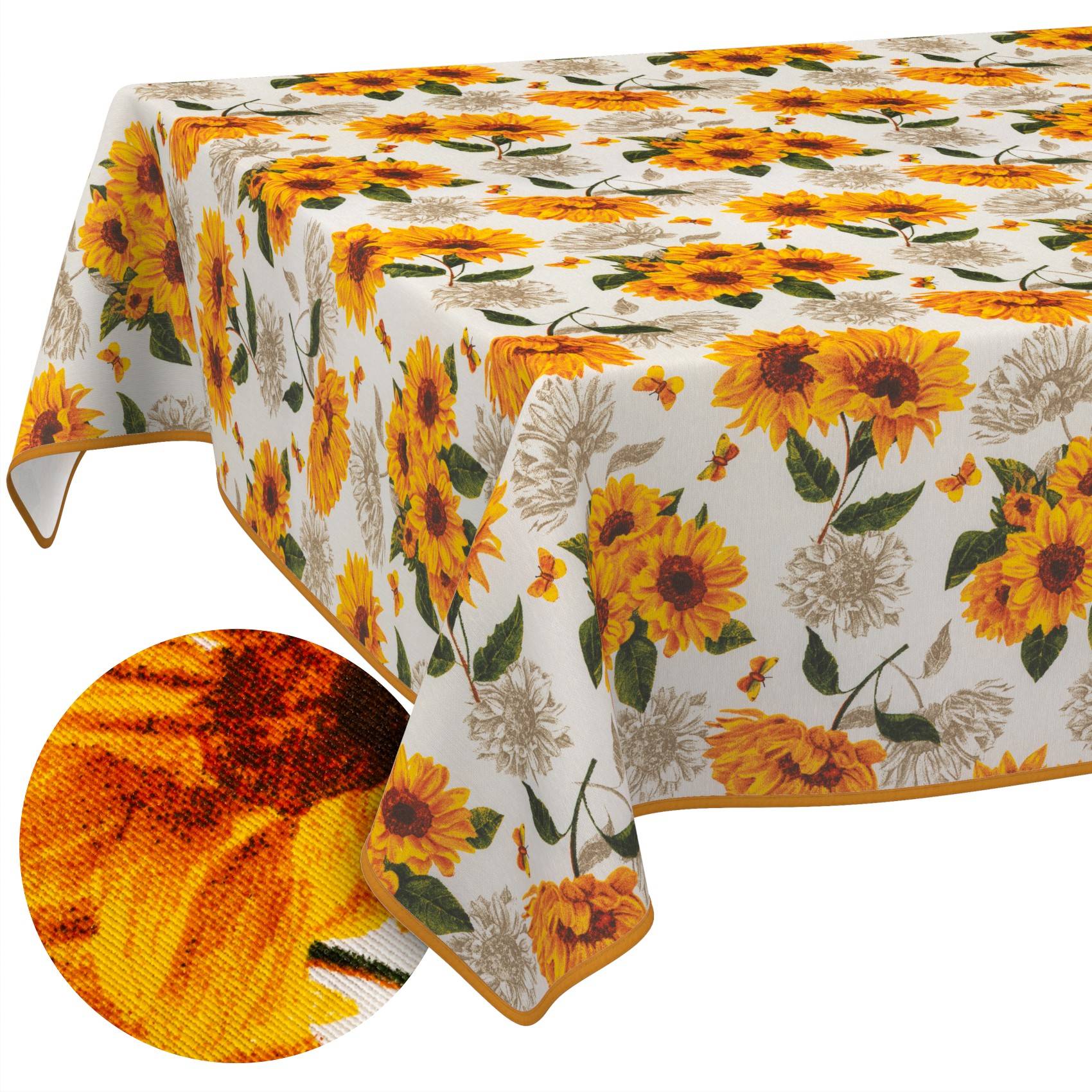 Sonnenblumen-gemustertes Tischtuch mit cremefarbenem Hintergrund und goldfarbener Borte, dargestellt mit einer kreisförmigen Nahaufnahme des strukturierten Stoffes.