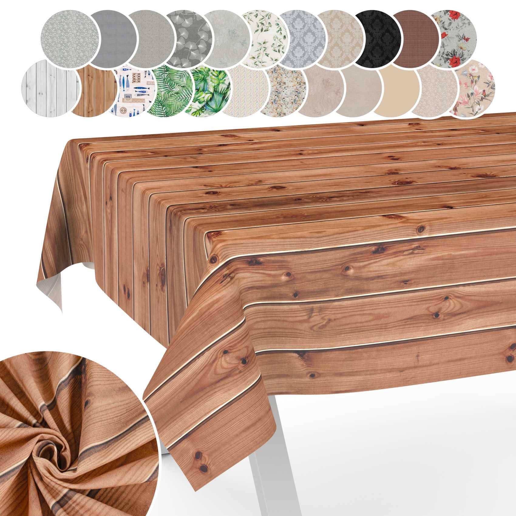 Holzgemusterte Tischdecke, über einen Tisch drapiert, mit Designmusterkarten über die obere Kante und eine Nahaufnahme des Stoffes im Einsatz unten links.