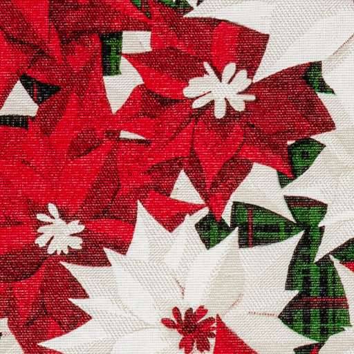 Nahaufnahme von roten und weißen weihnachtssternartigen Blüten auf gemustertem Stoff.