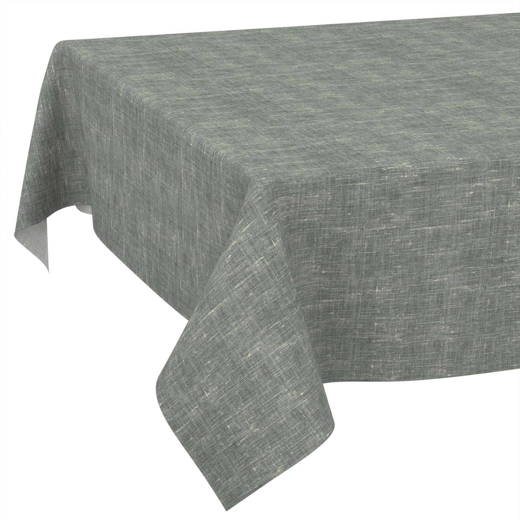 Grau strukturierter Tischdecke, die über einem Tisch drapiert ist, mit hängenden Ecken vor weißem Hintergrund.