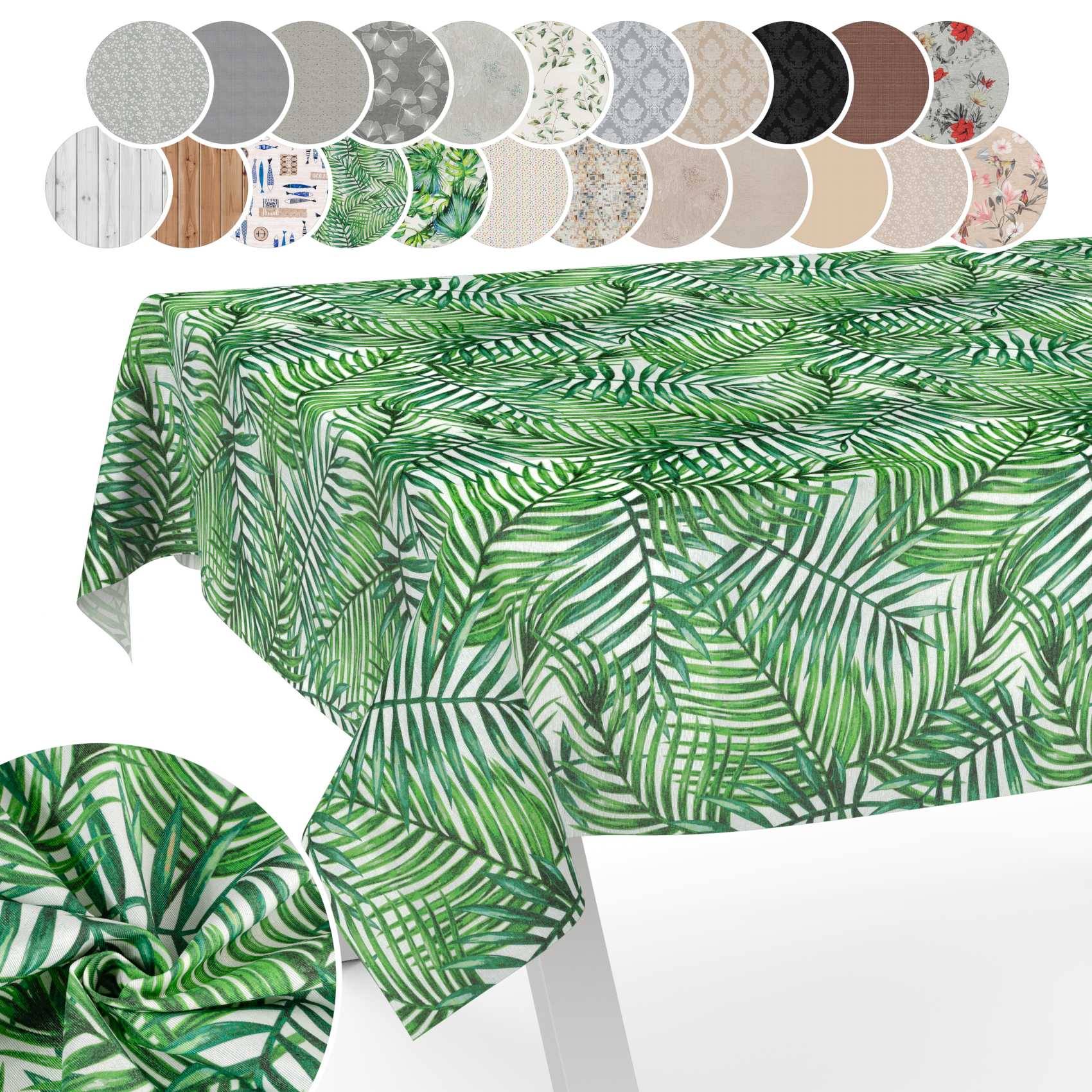 Grüne Tischdecke mit Palmenblatmuster, über einem Tisch drapiert, mit kreisförmigen Stoffmustern, die andere verfügbare Muster und Farben darüber zeigen.
