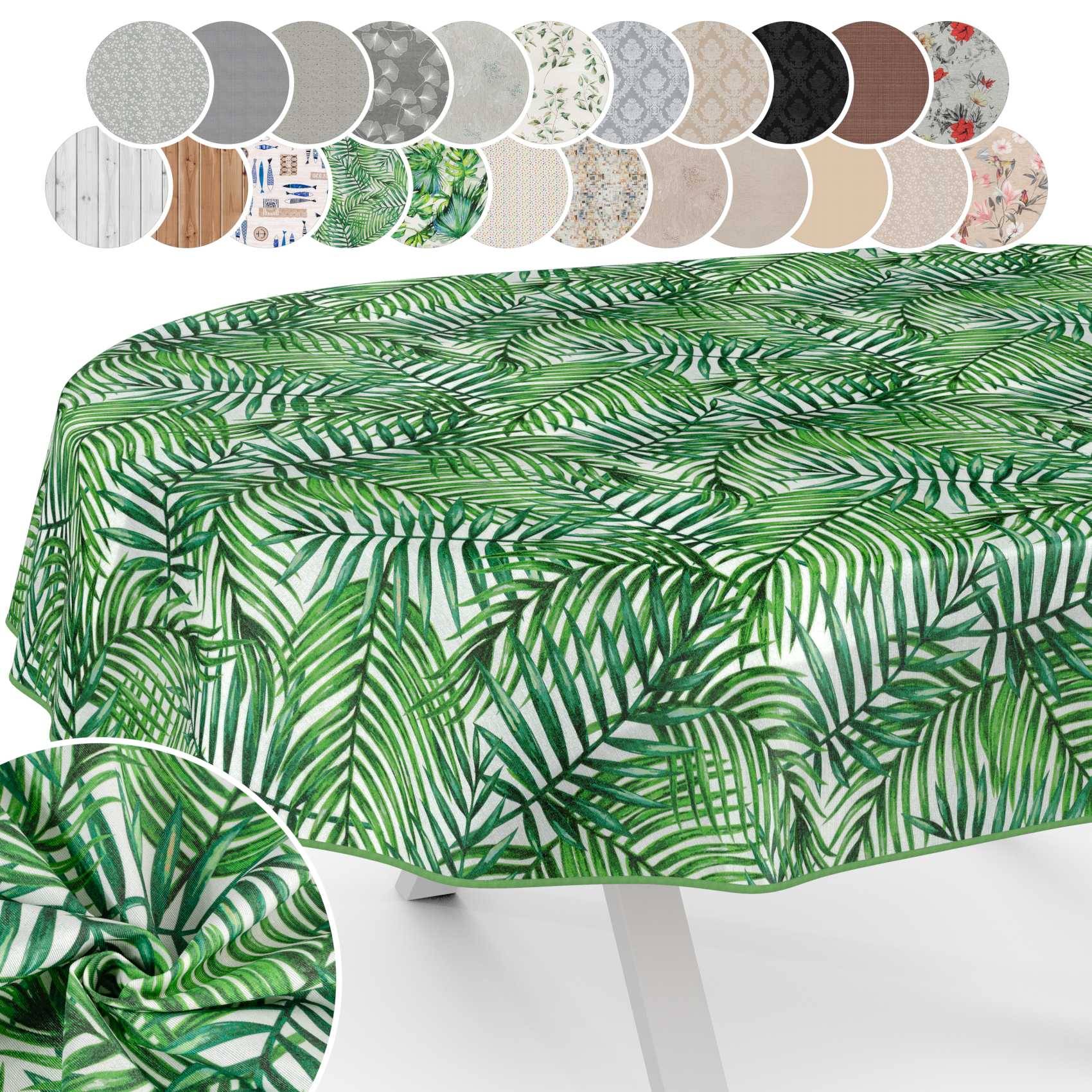 Tisch mit grüner Tischdecke mit tropischem Palmblatt-Muster, mit darüber gezeigten Stoffmustern und einer Nahaufnahme des Drucks in einem Einschub.