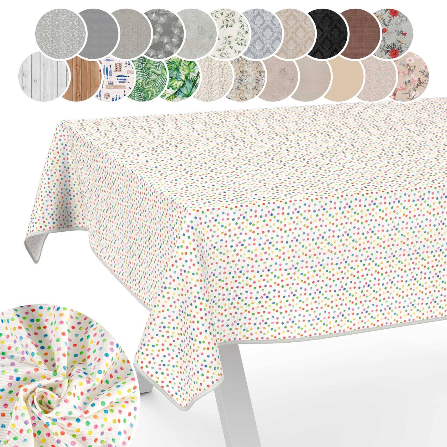 Tisch mit weißer Tischdecke mit weißen Punkten, oben mit Mustern, die verfügbare Stoffmuster und Farben zeigen.
