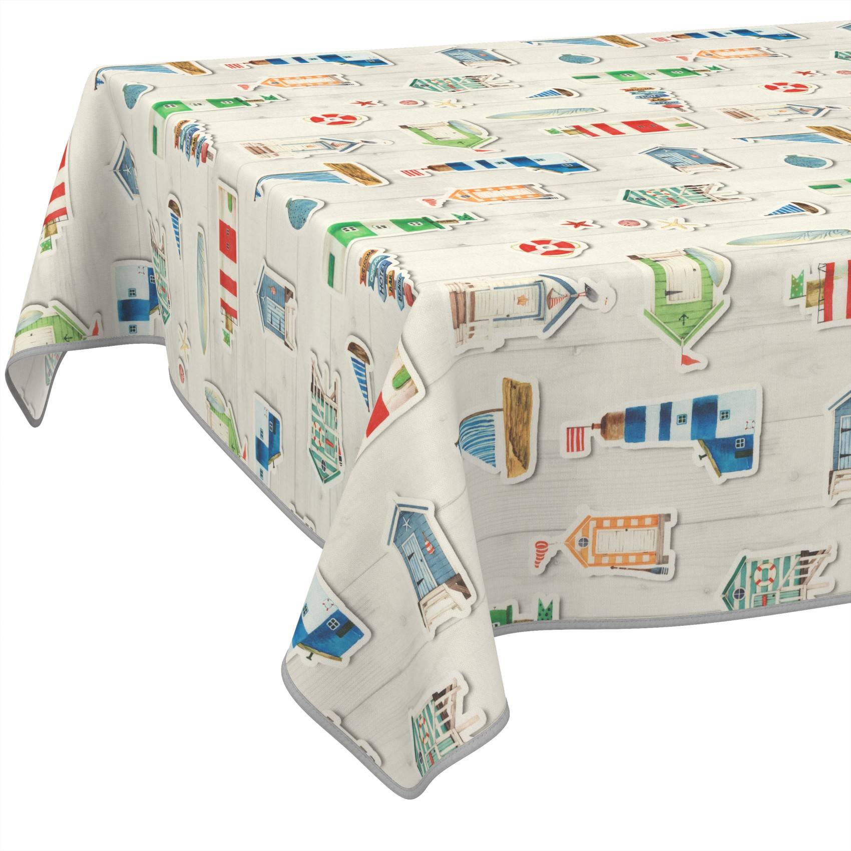 Weiße Tischdecke mit bunten Reisesymbolen und Gebäuden bedruckt, über einen rechteckigen Tisch drapiert.