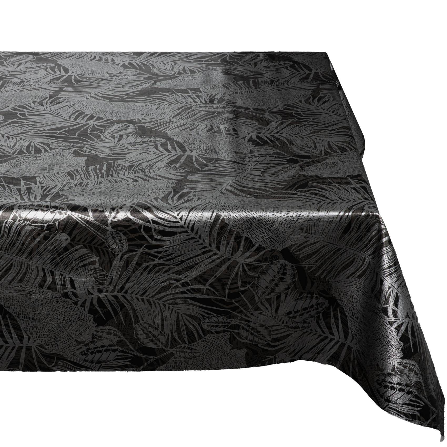 Schwarze Tischdecke mit einem subtilen Palmblattmuster, das über die Tischkante drapiert ist