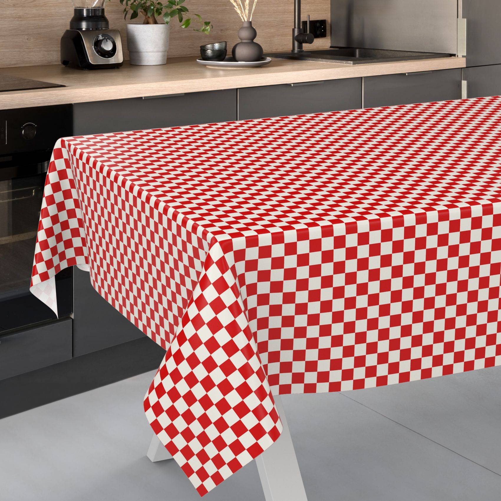 Küchentisch mit einer rot-weiß karierten Tischdecke bedeckt.