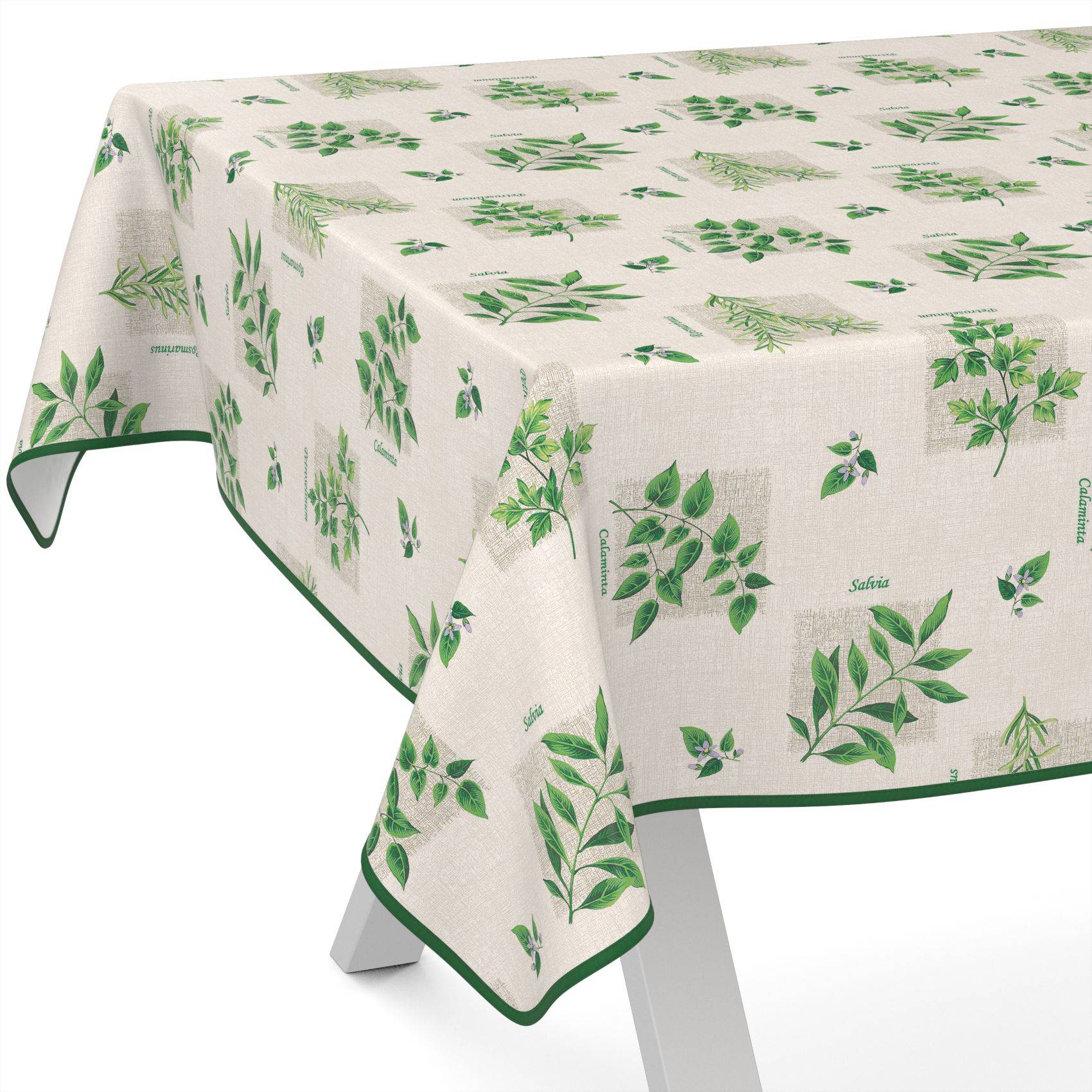 Rechteckige Tischdecke mit grünen Blatt- und Kräuterdrucken und dunkelgrüner Einfassung, die über einem Tisch mit weißen Beinen drapiert ist.
