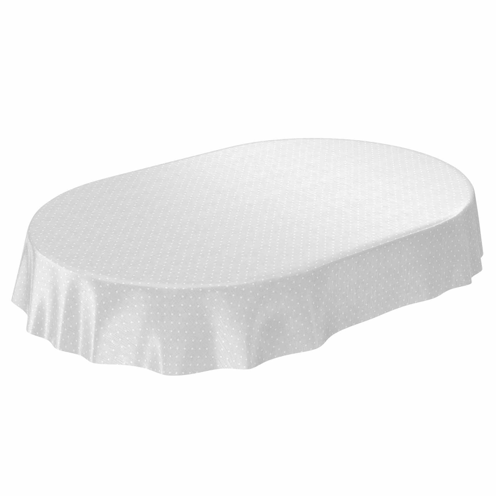 Ovaler Tisch mit einer weißen Tischdecke mit Punktmuster auf einfachem Hintergrund.
