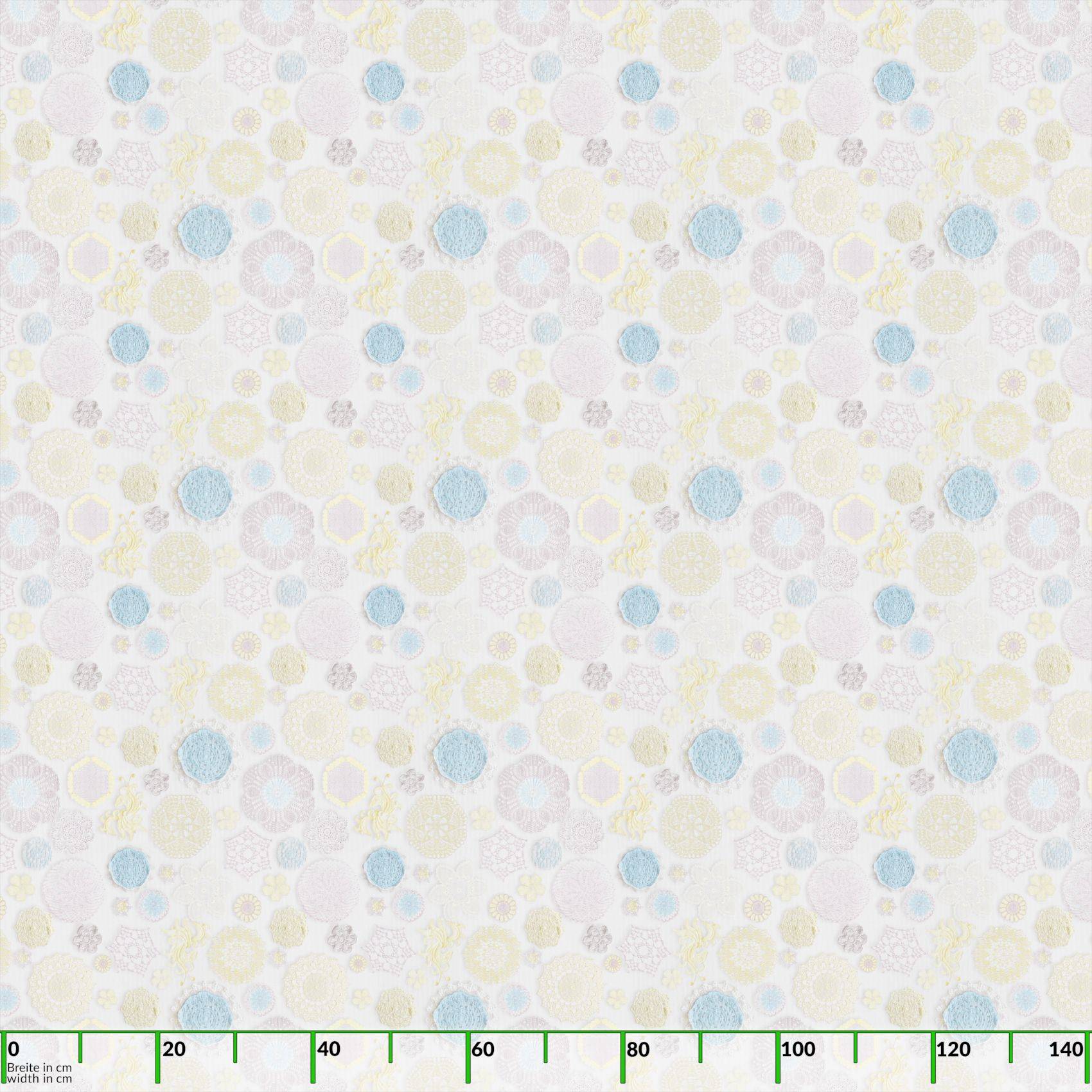 Weiß gemusterter Stoff mit hellblauen und gelben Punkten und floralen Motiven, mit einem Lineal unten zur Größendarstellung.