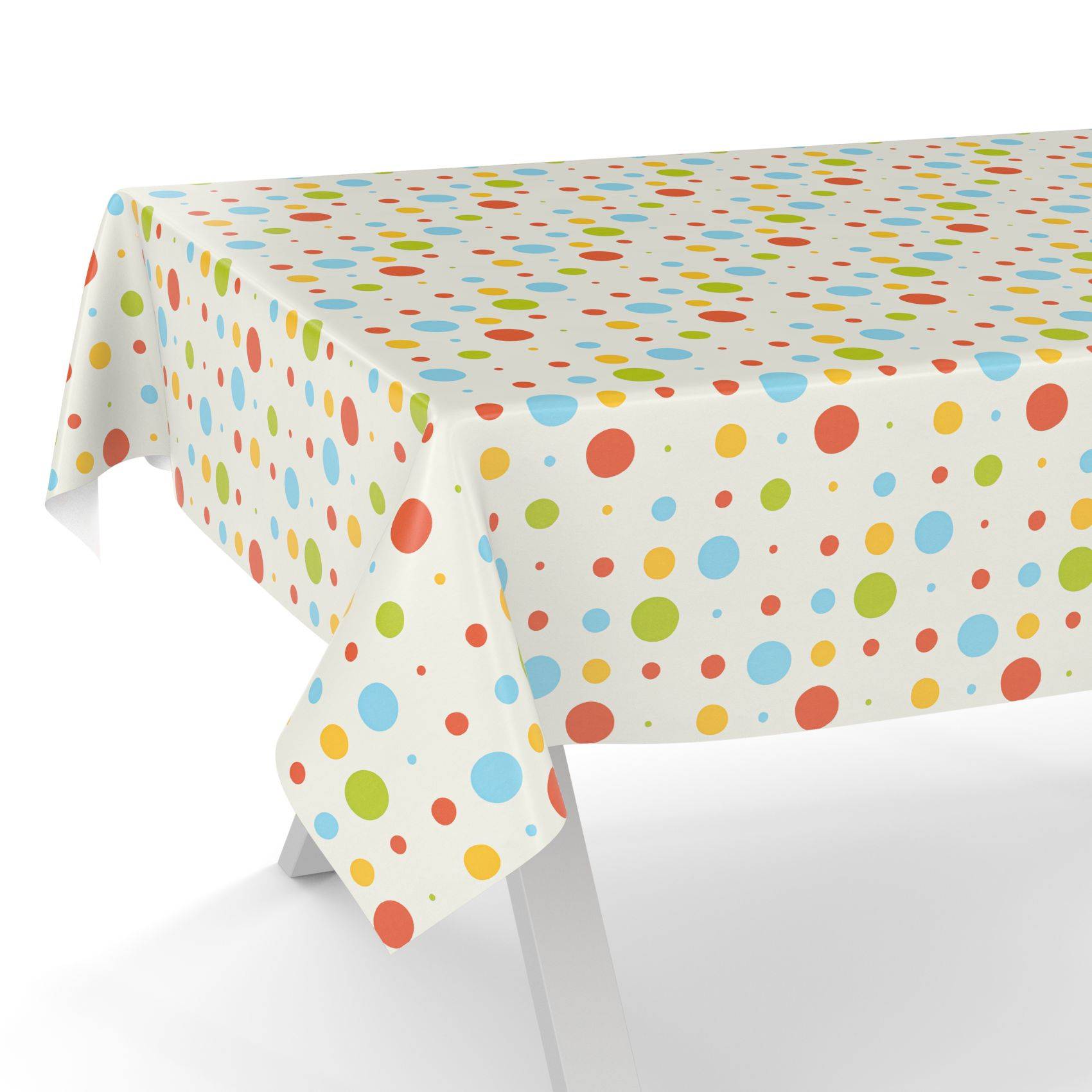 Farbenfrohe Tischdecke mit Punktmuster über einem rechteckigen Tisch mit weißen Beinen drapiert.