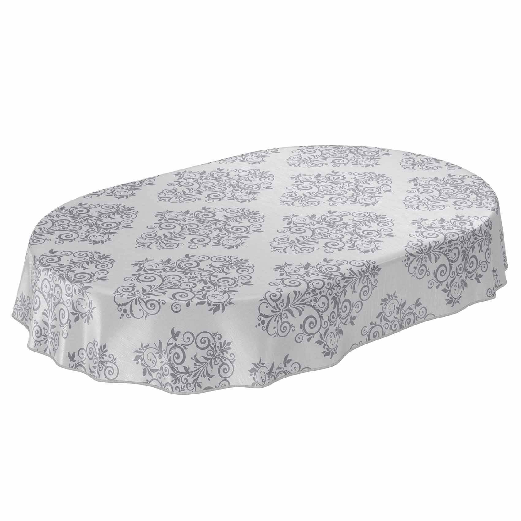 Ovale Tischdecke mit einem hellgrauen Blumenmuster, drapiert über einem Tisch vor weißem Hintergrund.