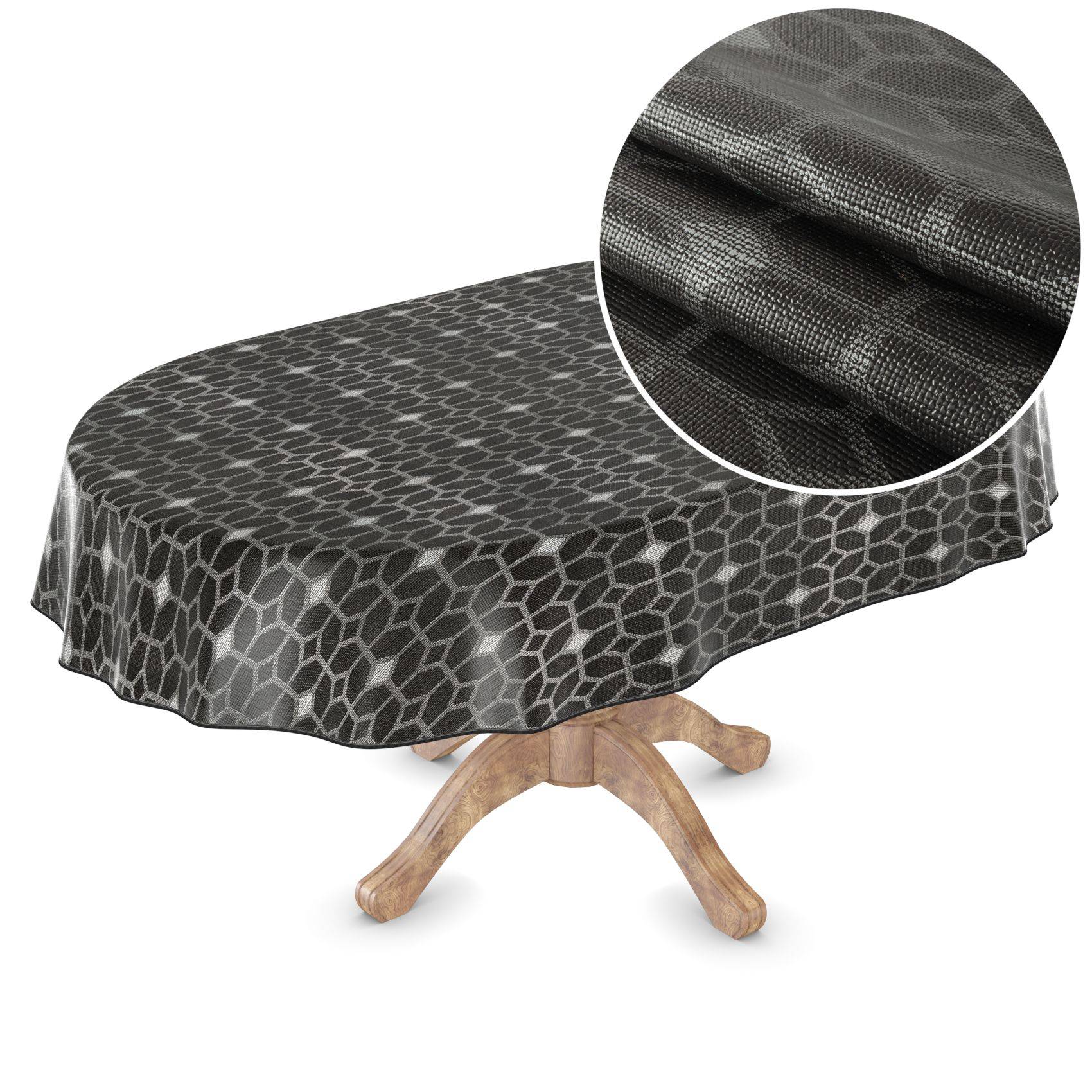 Runder Tisch, bedeckt mit einer graugeometrierten Tischdecke mit gemustertem Design, mit einer Nahaufnahme, die die Fadentextur des Stoffes zeigt.