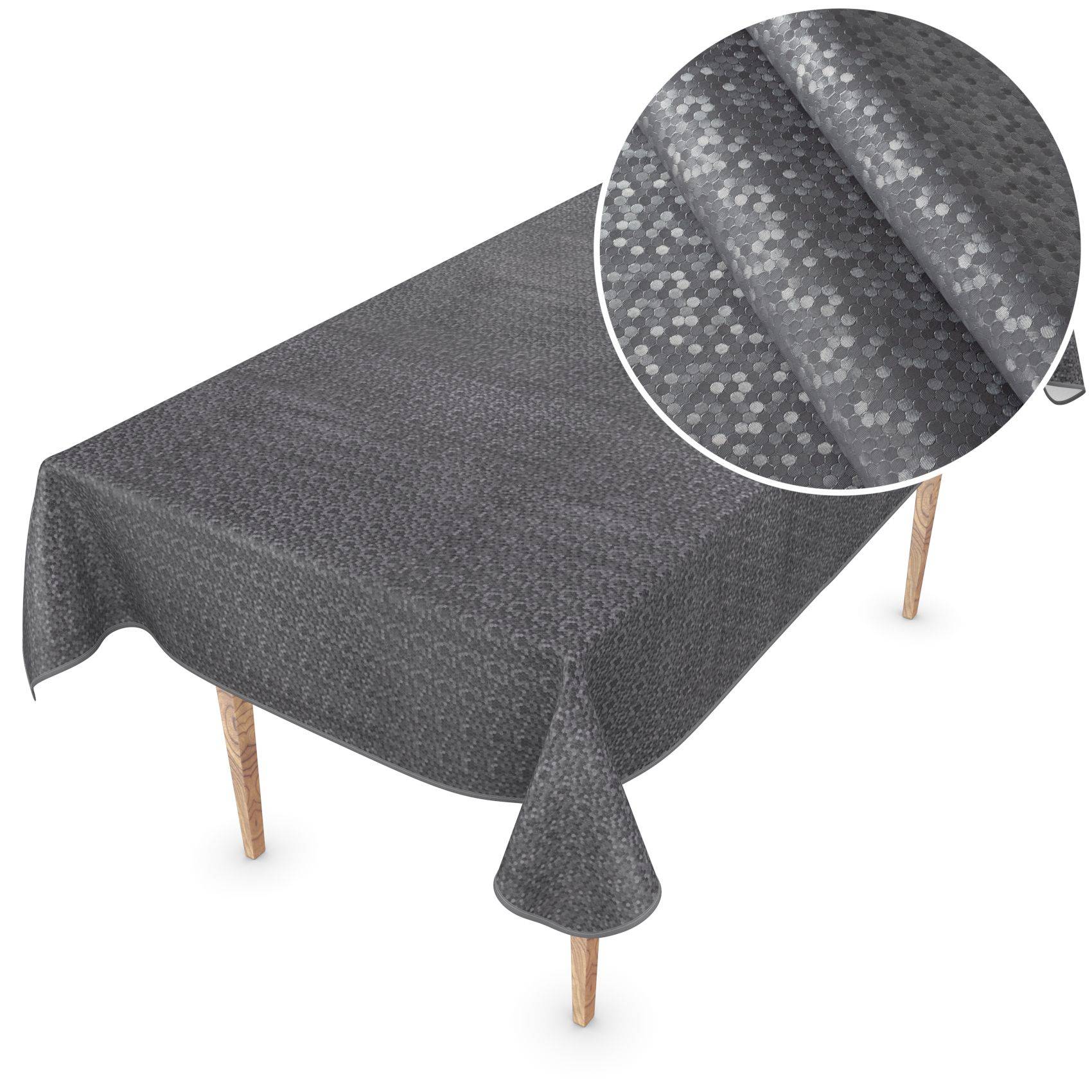 Grau gemustertes Tischtuch, das über einen rechteckigen Tisch drapiert ist, mit einer kreisförmigen Nahaufnahme-Einfügung, die die Stofftextur und das Punktmuster zeigt.