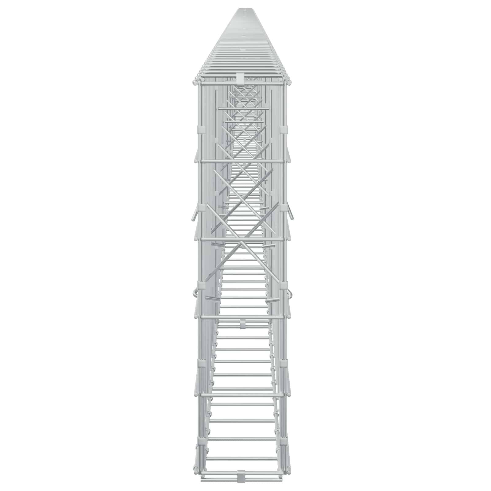 Ein hohes graues Industrie-Turm- oder Gerüstbauwerk, frontal dargestellt, mit schmalem Dach oben, innerer Queraussteifung und einem offenen, leiterartigen unteren Abschnitt.