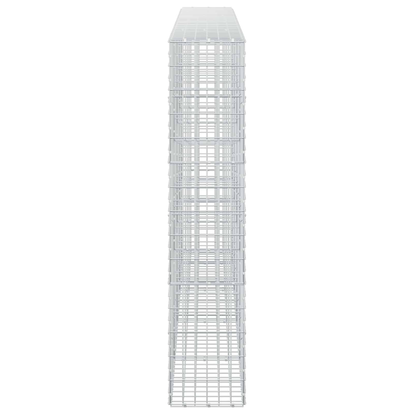 Ein großer, schmaler weißer Drahtgitterturm oder Käfig, der aufrecht auf einem schlichten Hintergrund steht.