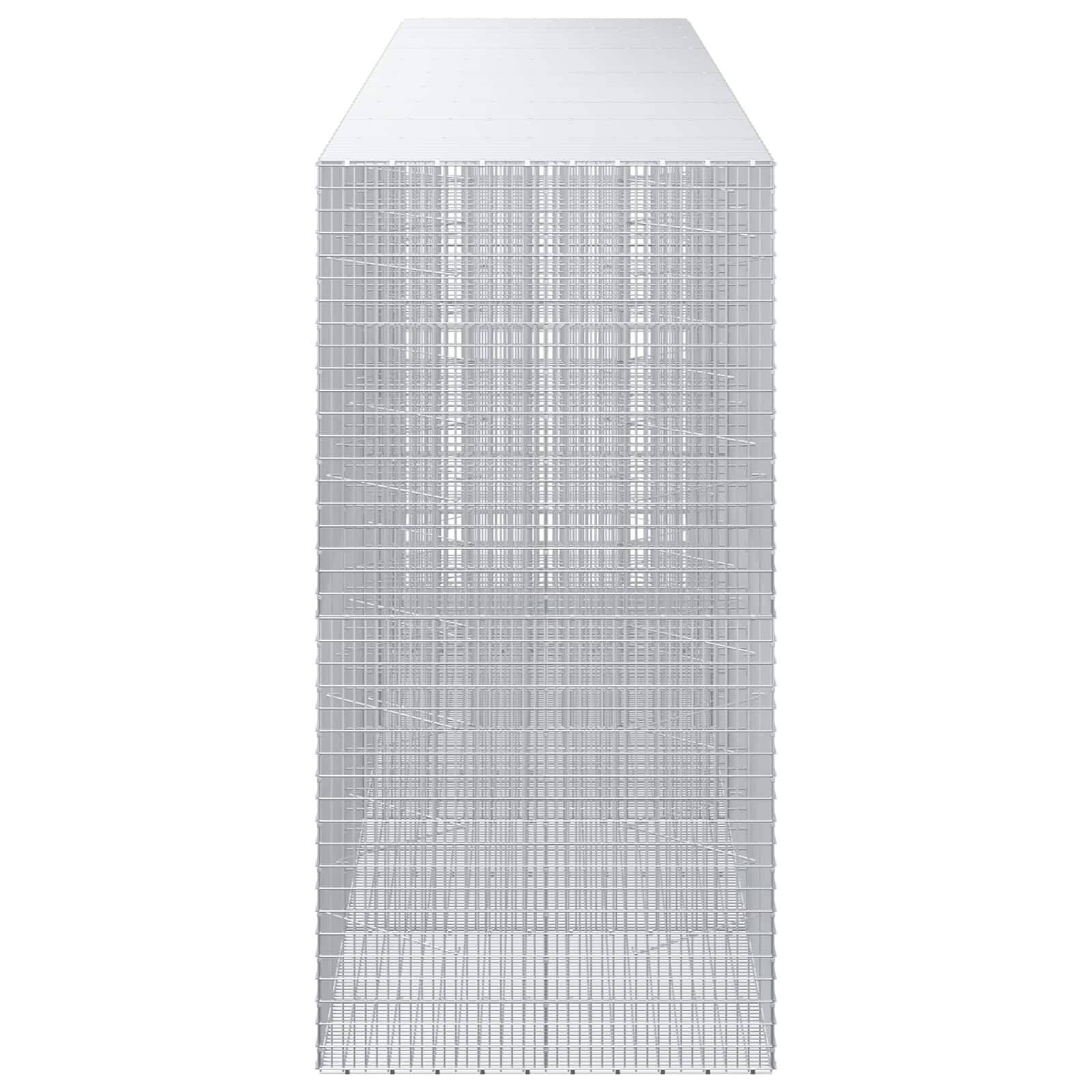 Draufsicht auf eine hohes rechteckiges weißes gitterartiges Gebilde mit flachem Dach, das einem Hochhausmodell oder Turm ähnelt.