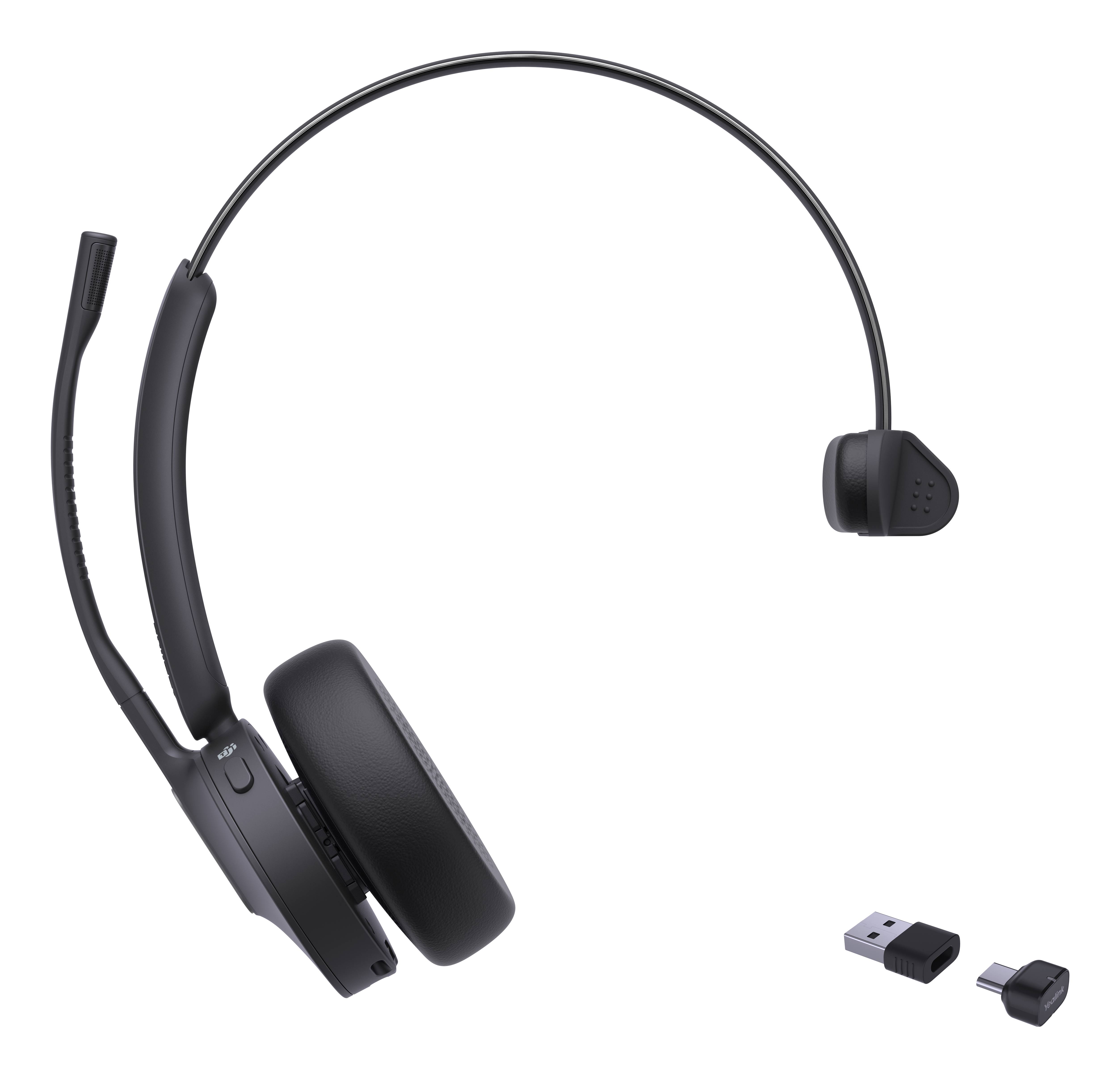 Kabelloses schwarzes Headset mit Boom-Mikrofon und USB-Dongle auf weißem Hintergrund