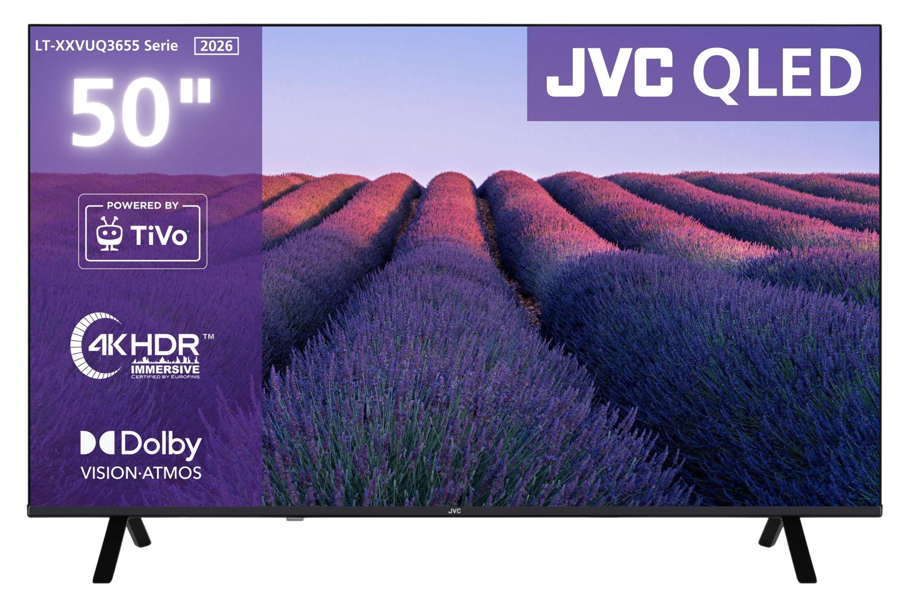 JVC QLED 50-Zoll-Fernseher mit schwarzem Rahmen und Ständer, dargestellt mit Werbebildschirm, der ein Lavendelfeld zeigt, sowie Bildschirmetiketten für 4K HDR, TiVo und Dolby Vision Atmos.