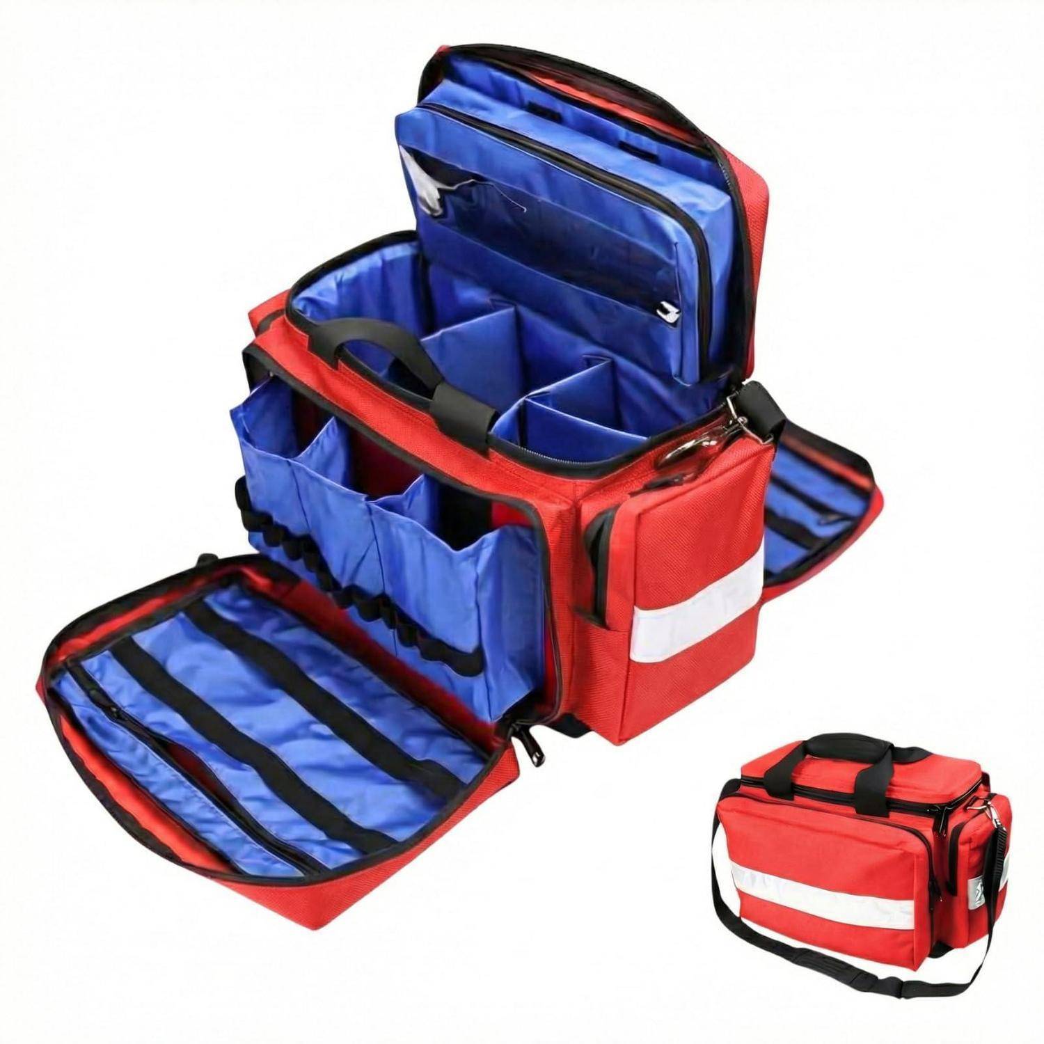 Rote und blaue isolierte medizinische Einsatztasche, offen, um die organisierten inneren Fächer zu zeigen, mit einer kleineren passenden Tasche daneben.