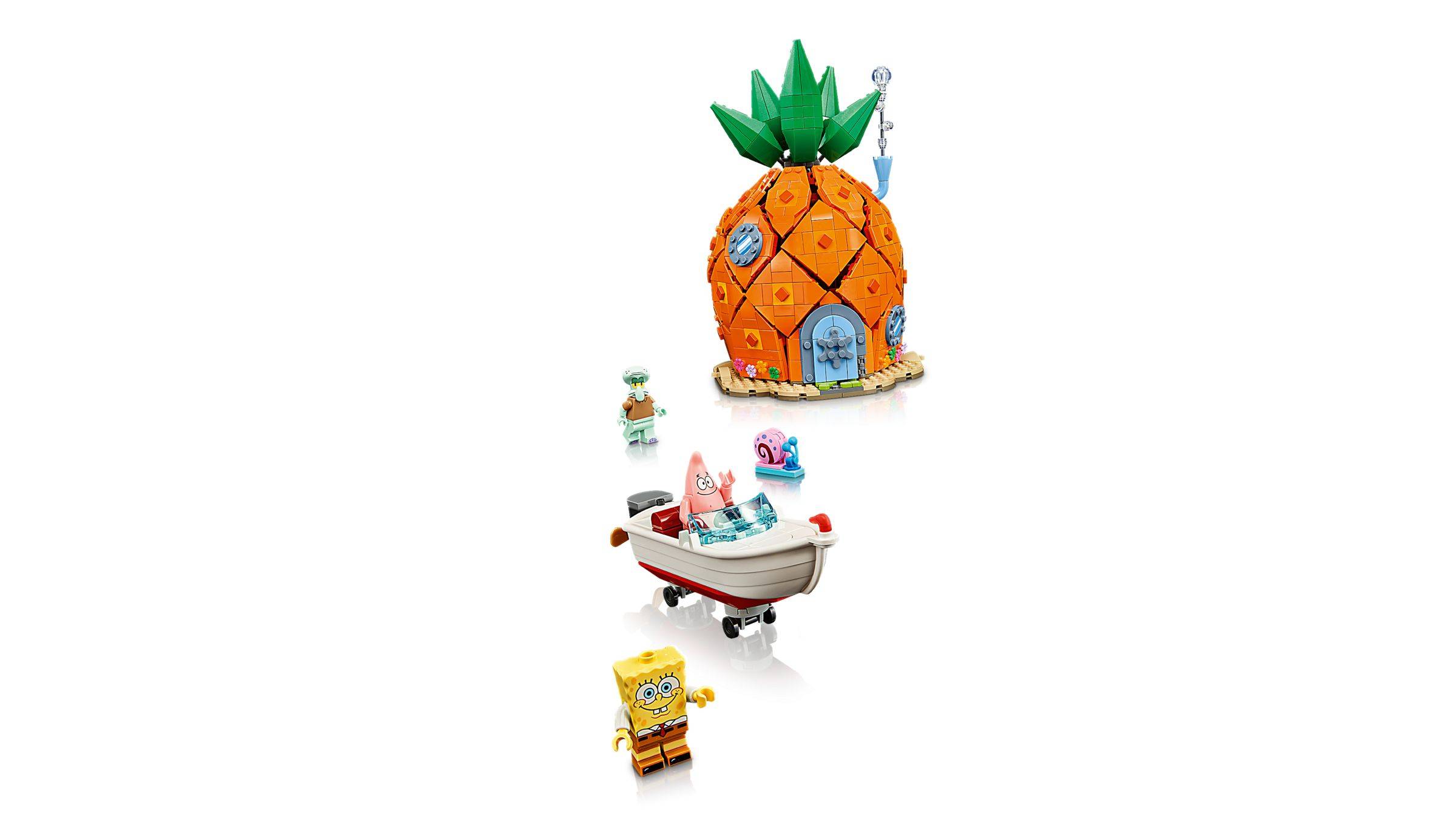 SpongeBob-Themen-Spielzeugszene mit SpongeBob, einem kleinen Boot und einem Ananashaus auf weißem Hintergrund.