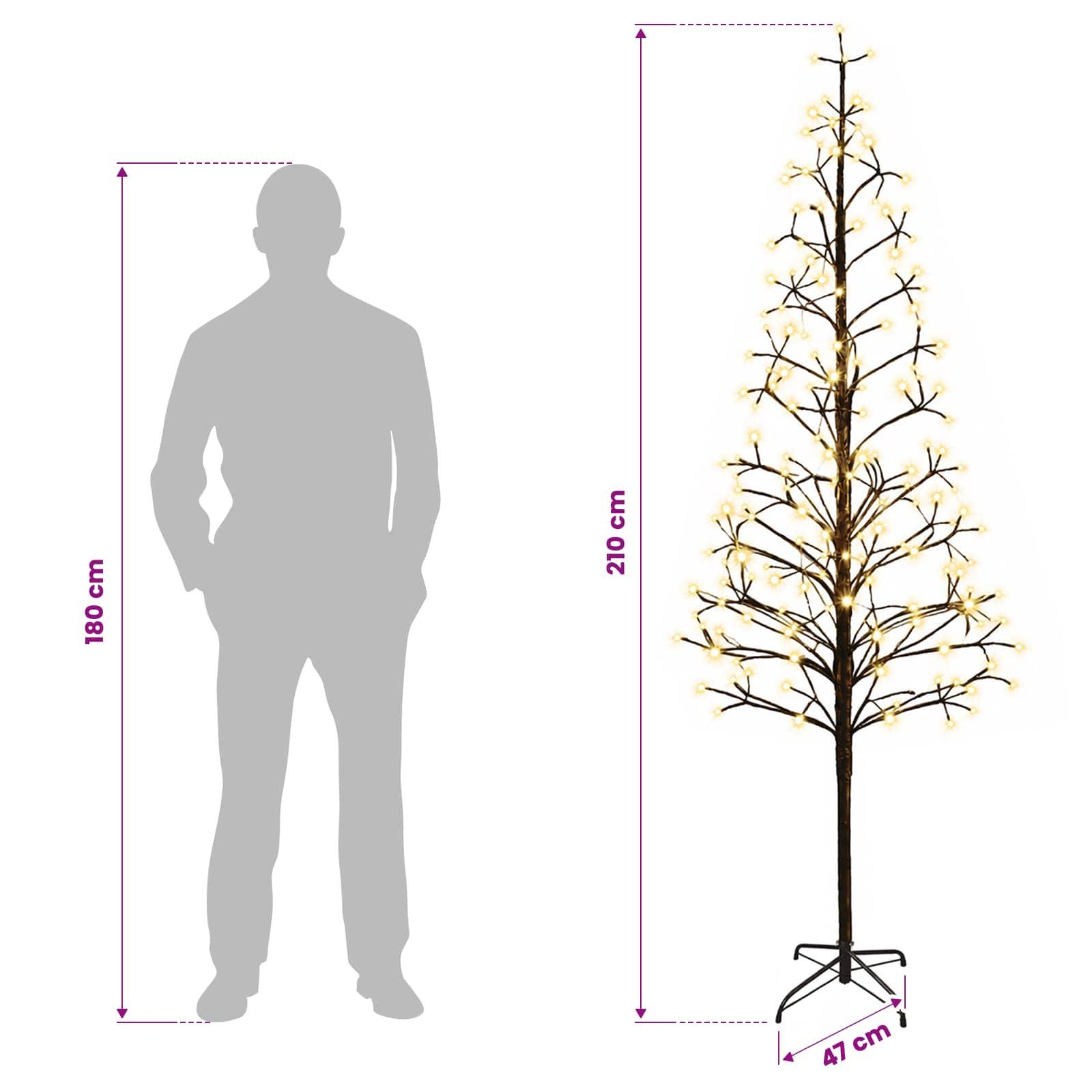 Silhouette einer 180 cm großen Person neben einem 210 cm hohen beleuchteten Baum auf einem 47 cm breiten Fuß, der die Produktgröße zeigt.
